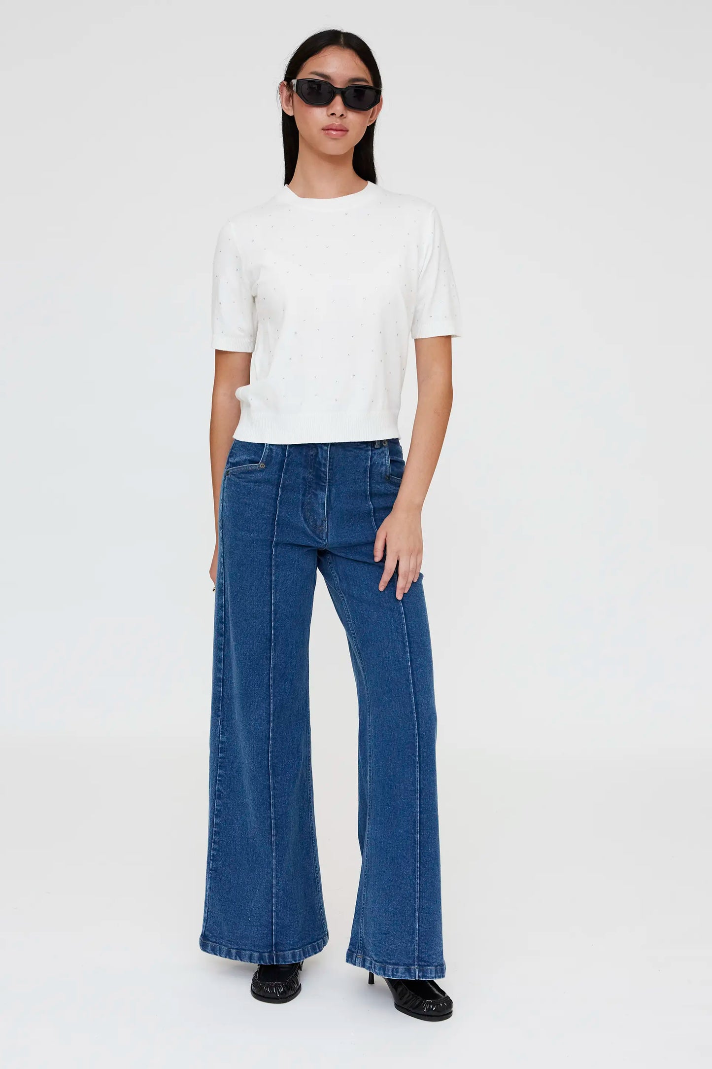 White knit top with rhinestone detail