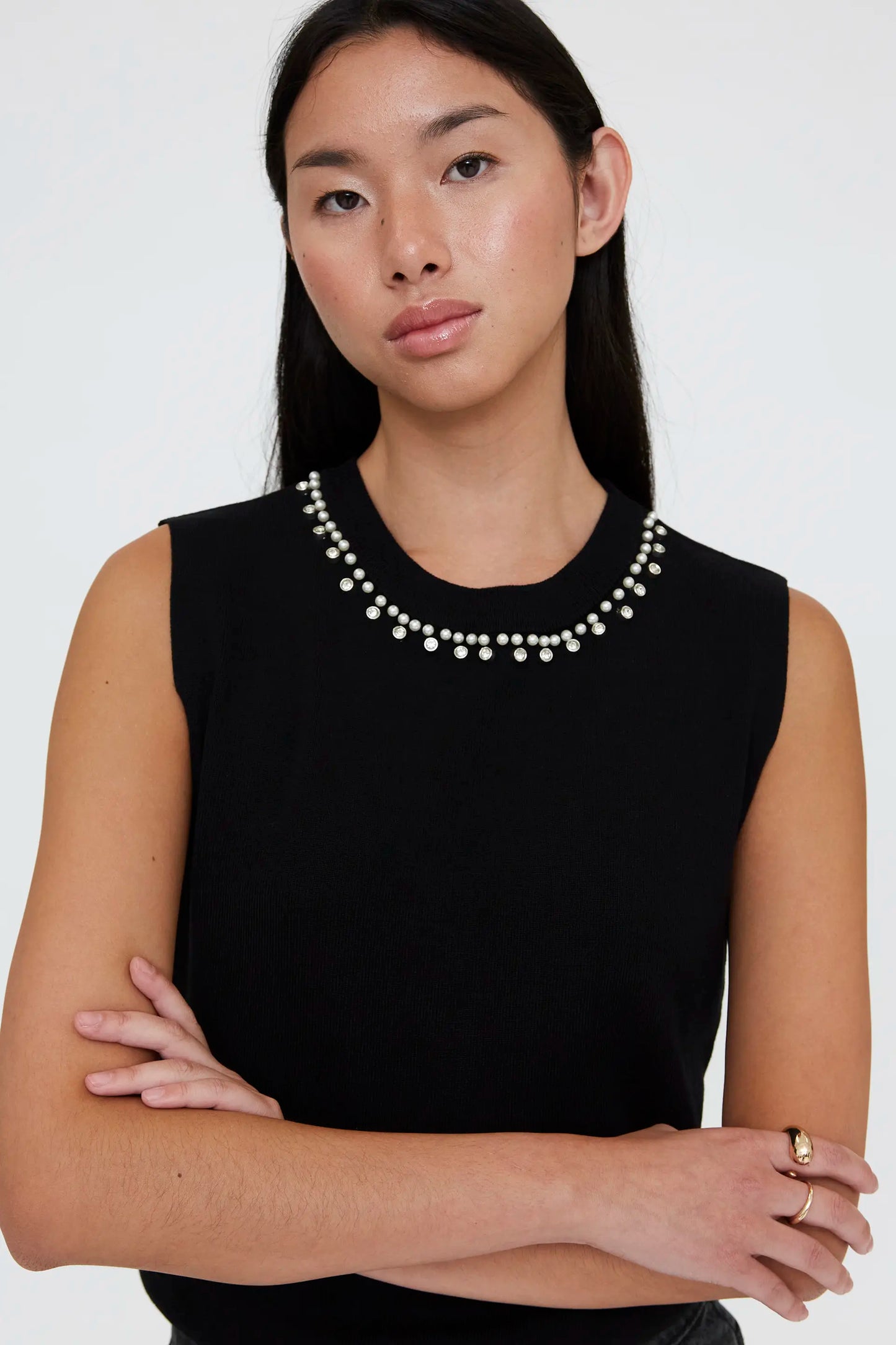 Black knit top with jewel neckline