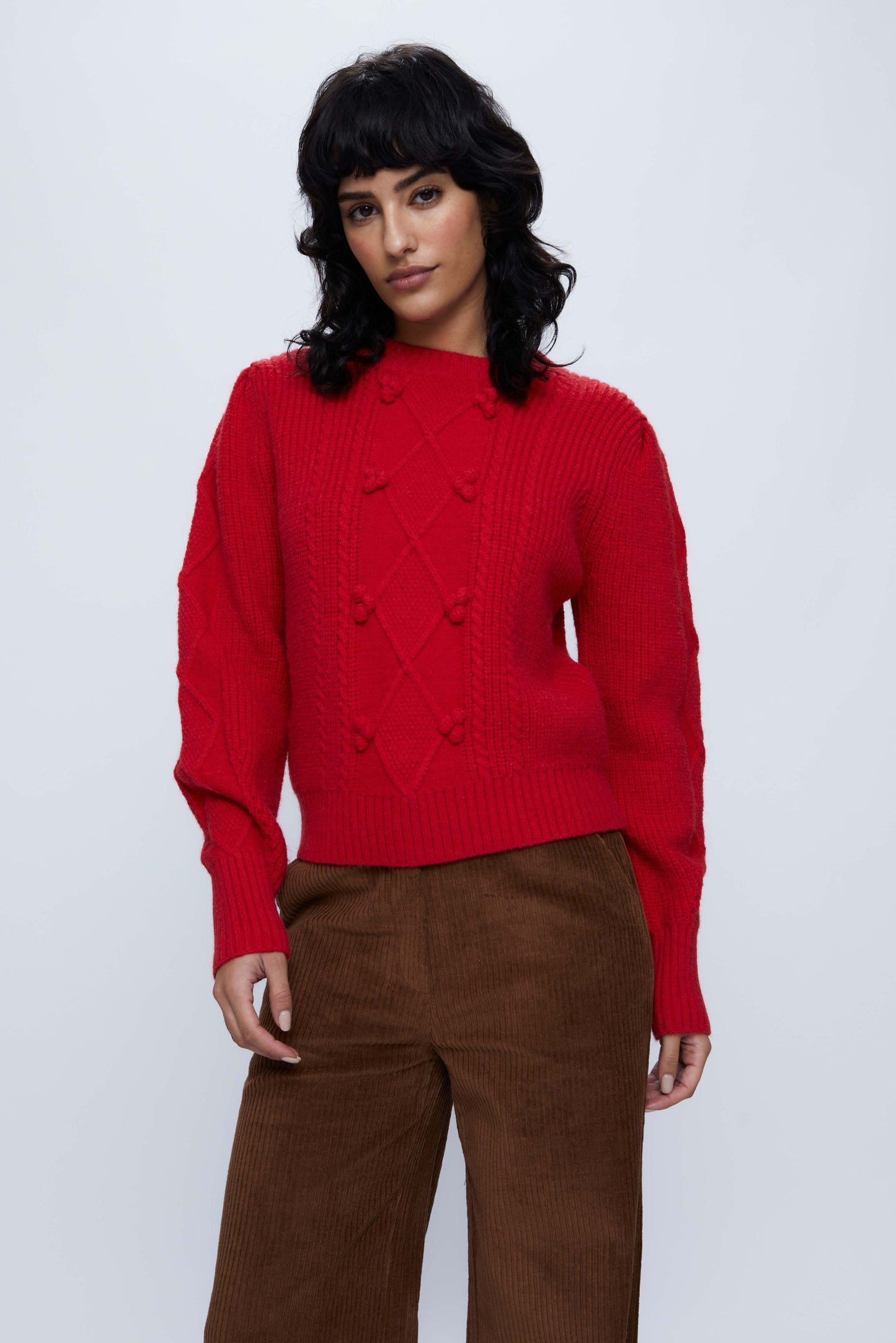 Red cable knit sweater