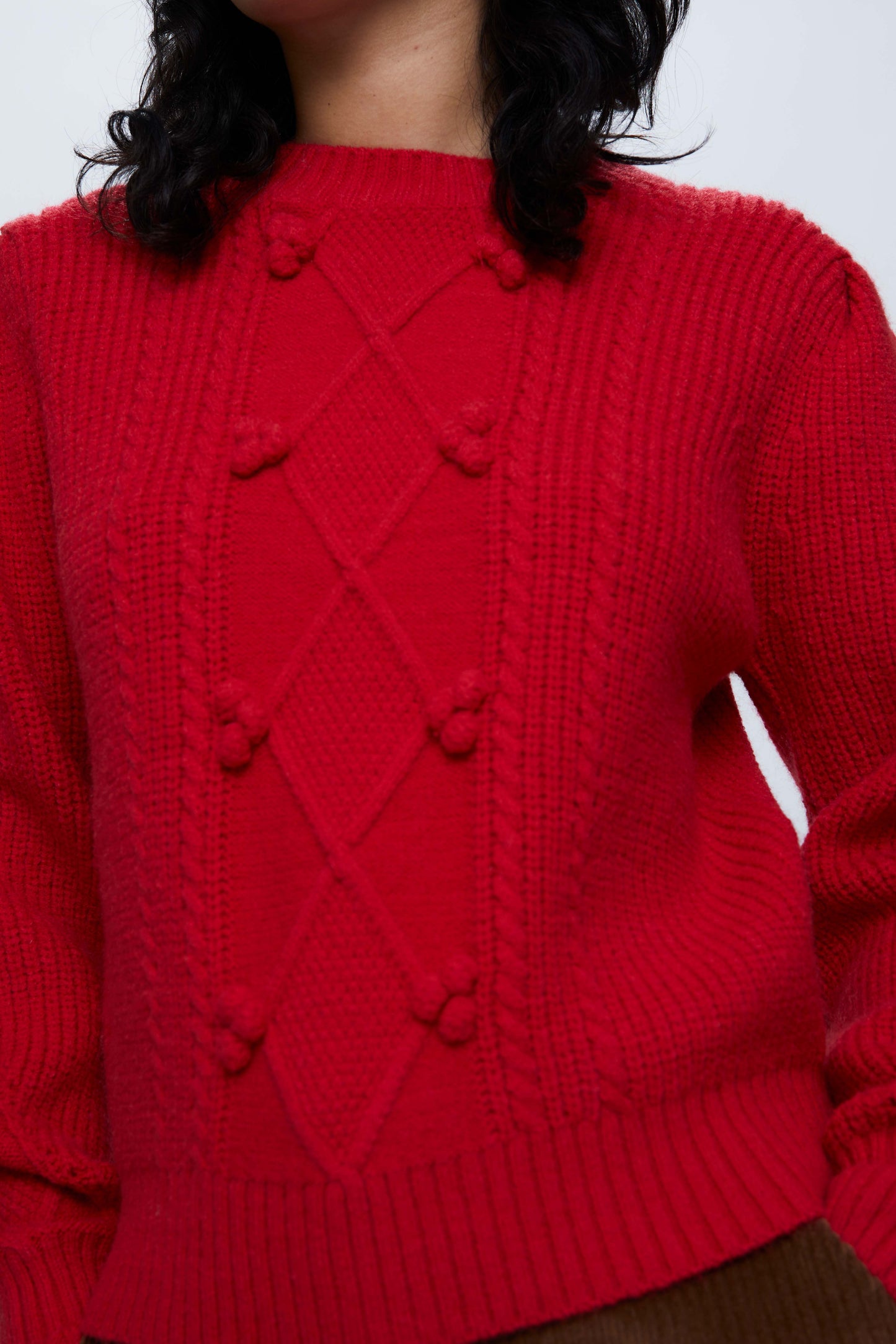 Red cable knit sweater