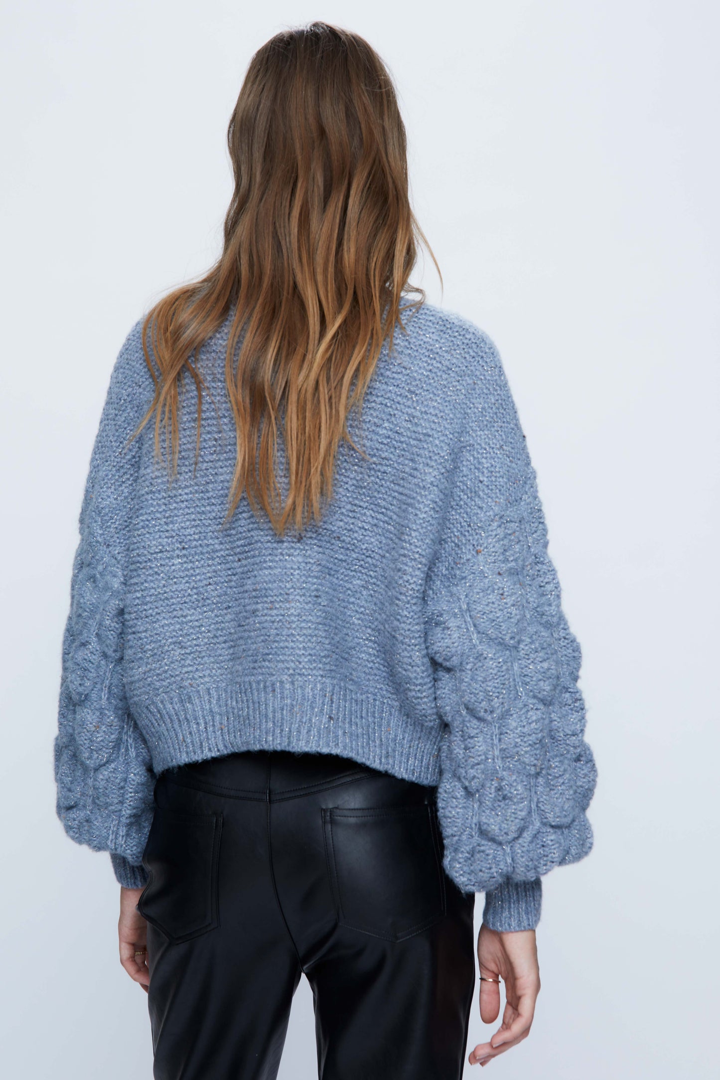 Knitted sweater with blue puff sleeves