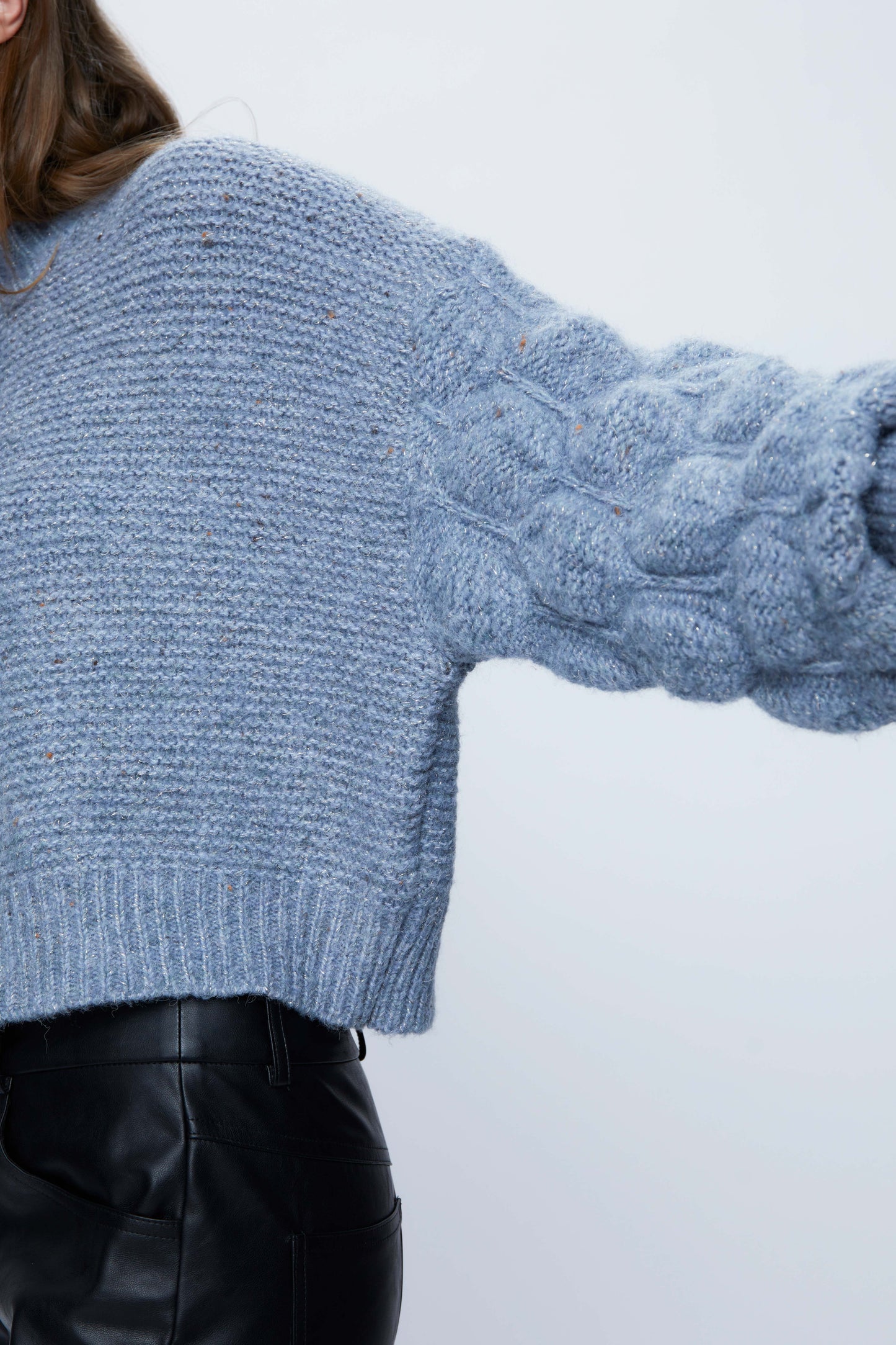 Knitted sweater with blue puff sleeves