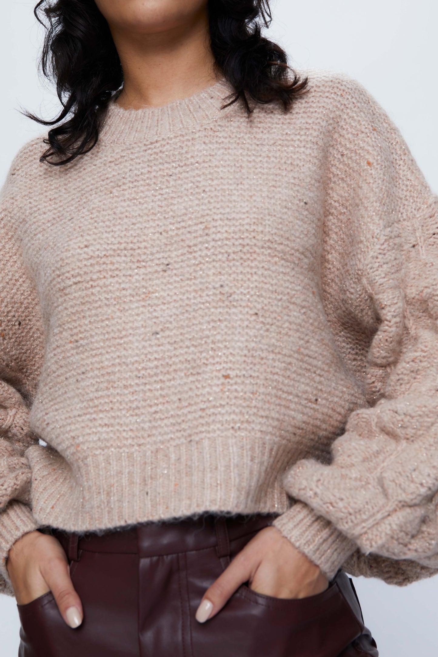 Knitted sweater with beige puff sleeves