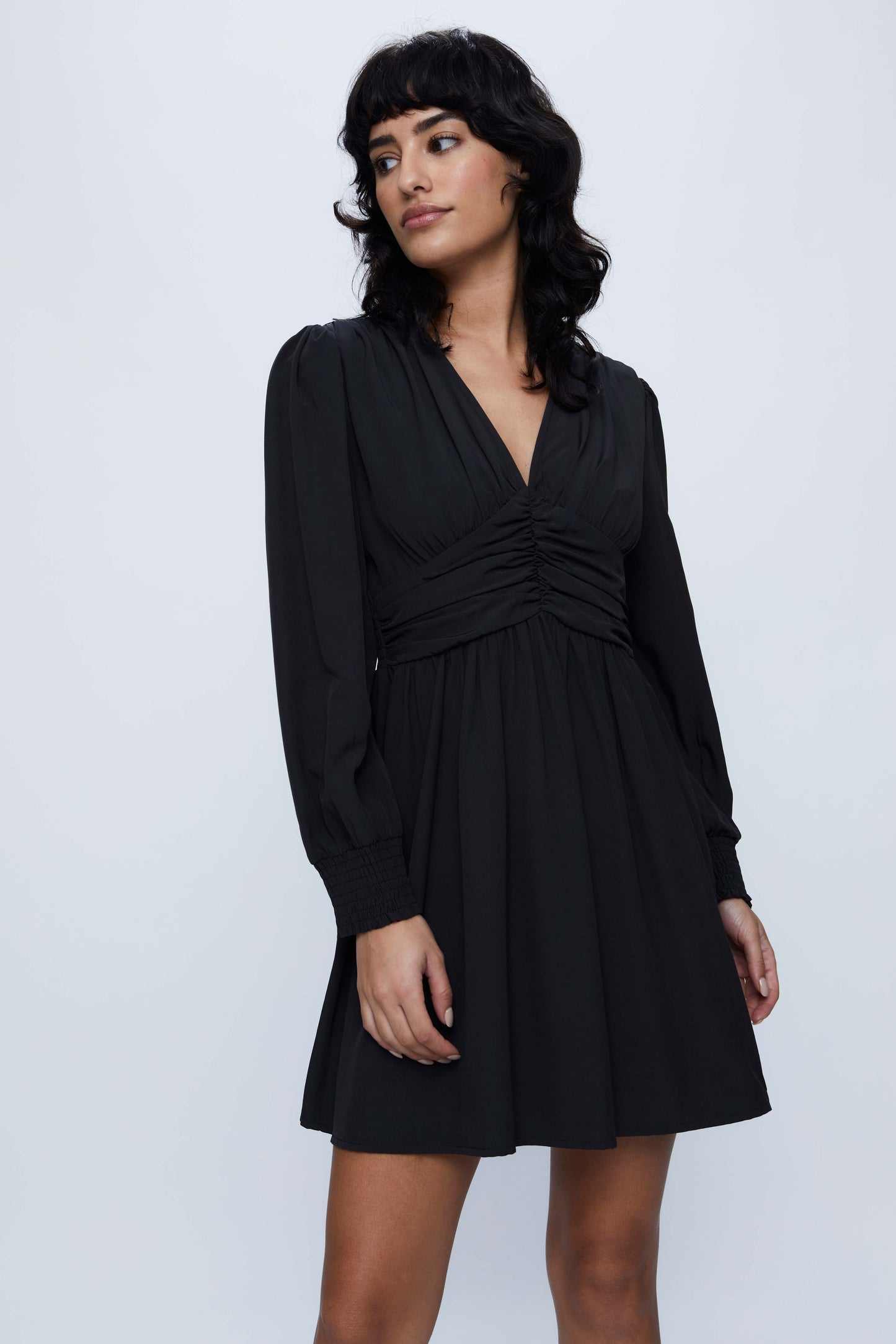 Short dress with long black sleeves