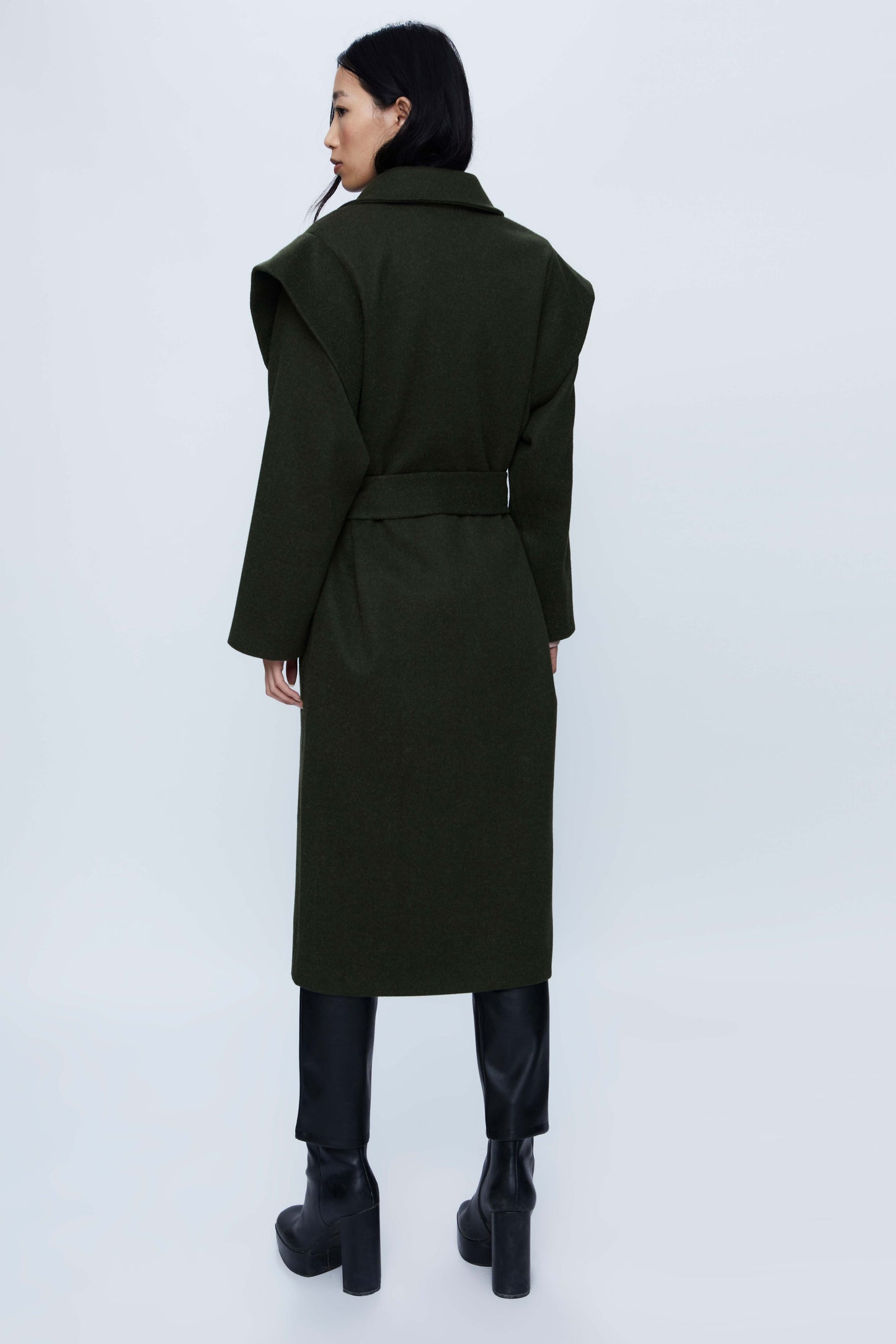 Long coat with green shoulder pads