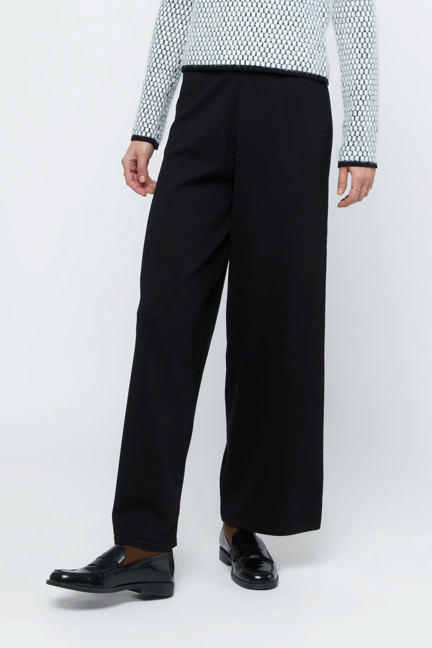 Black straight knit trousers