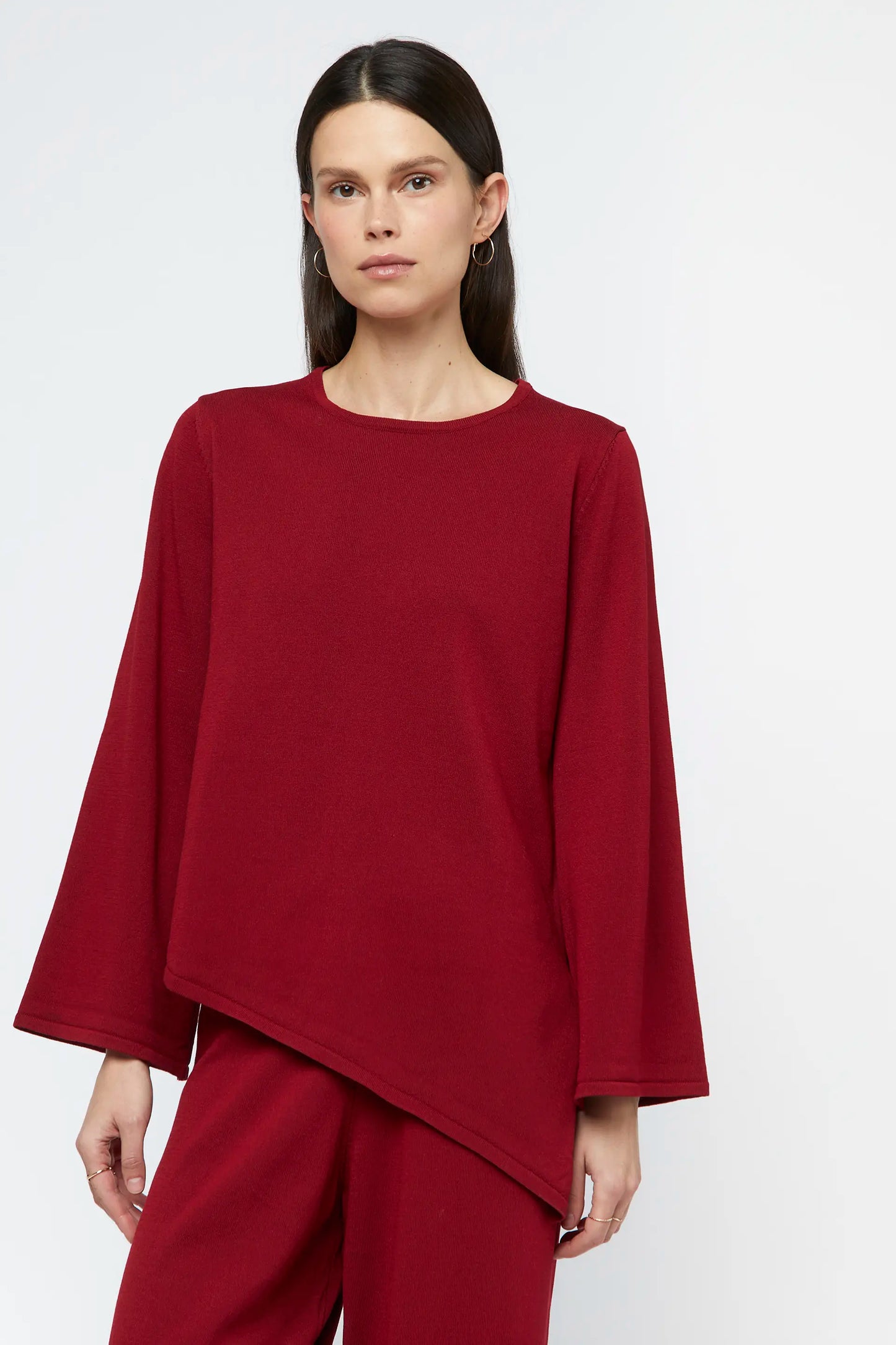 Asymmetric red knit sweater