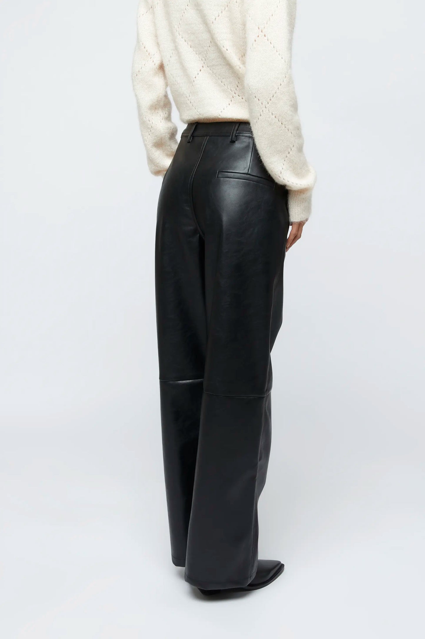 Black faux leather straight pants