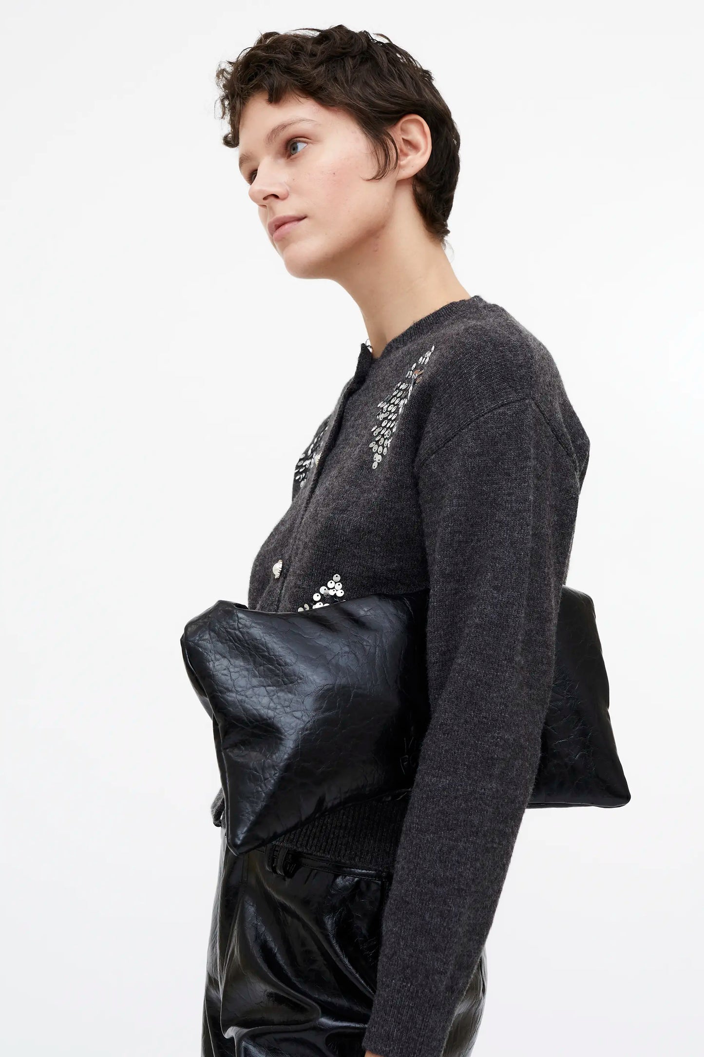 Cárdigan punto gris con detalles en lentejuelas