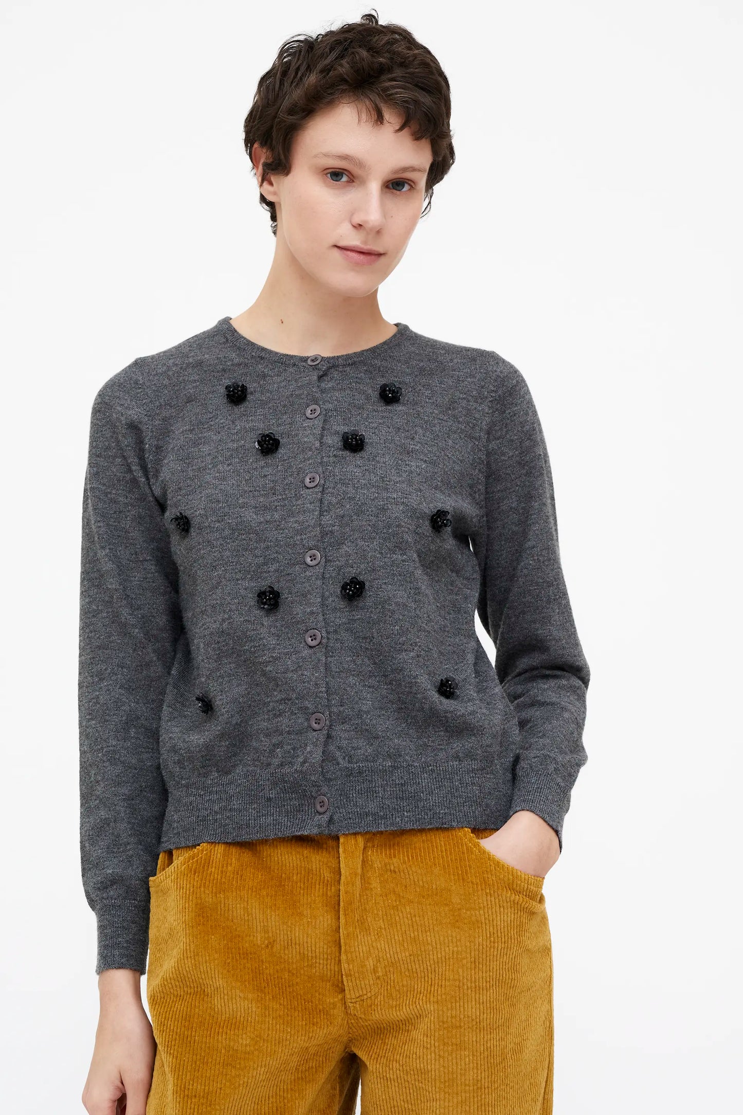 Cárdigan punto gris con flores de lentejuelas