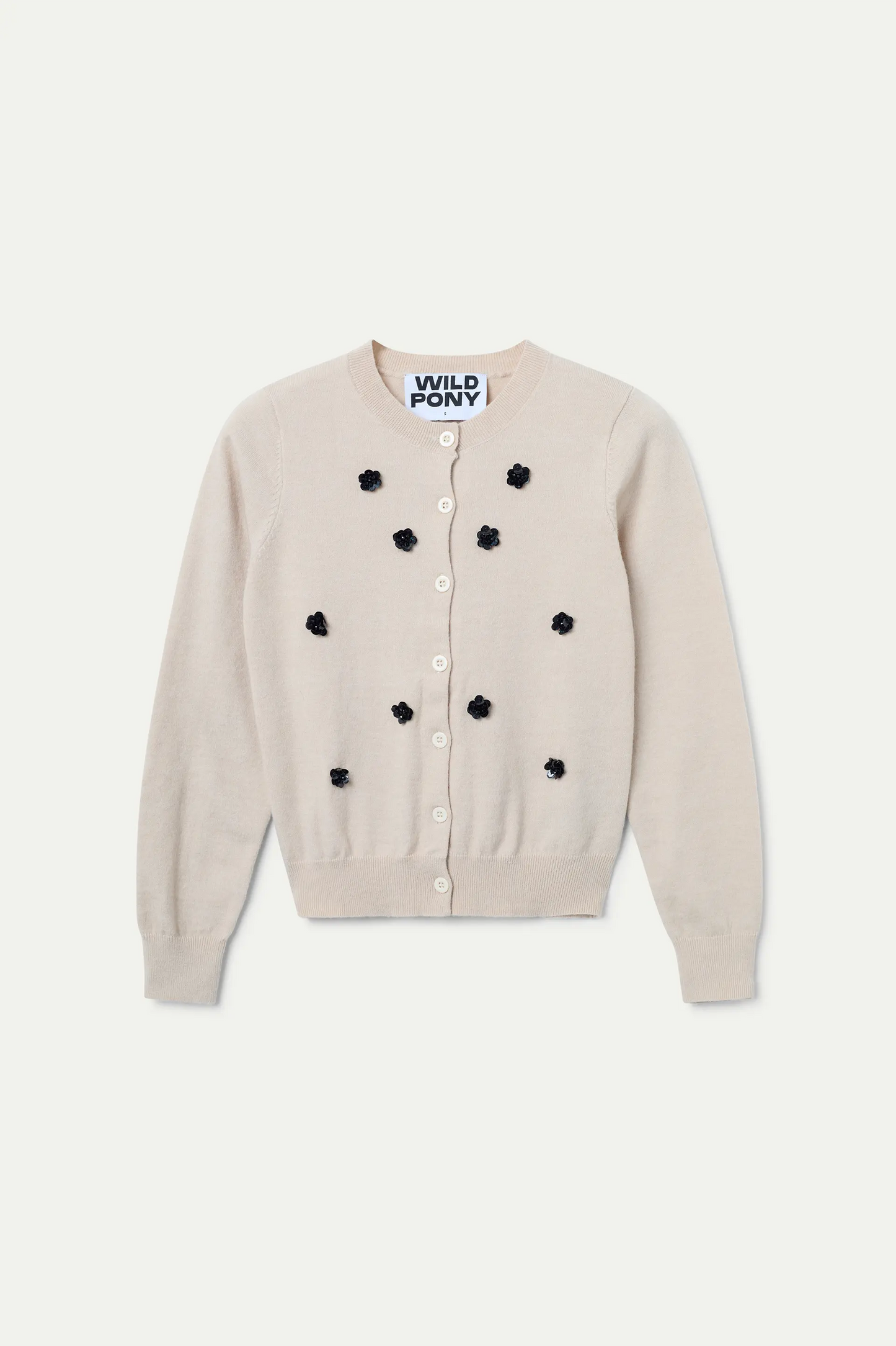 Cárdigan punto blanco con flores de lentejuelas