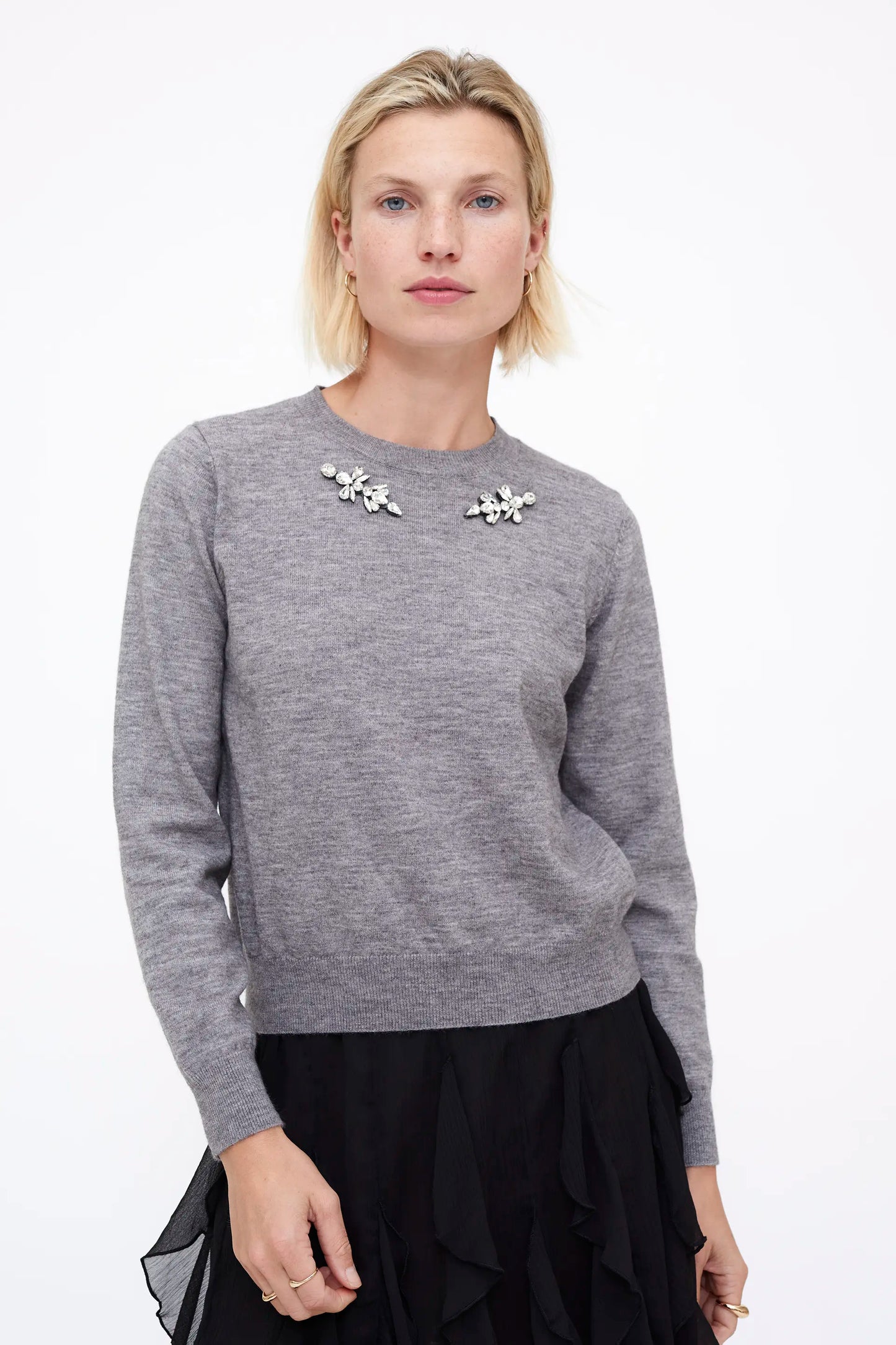 Jersey punto gris con aplique joya