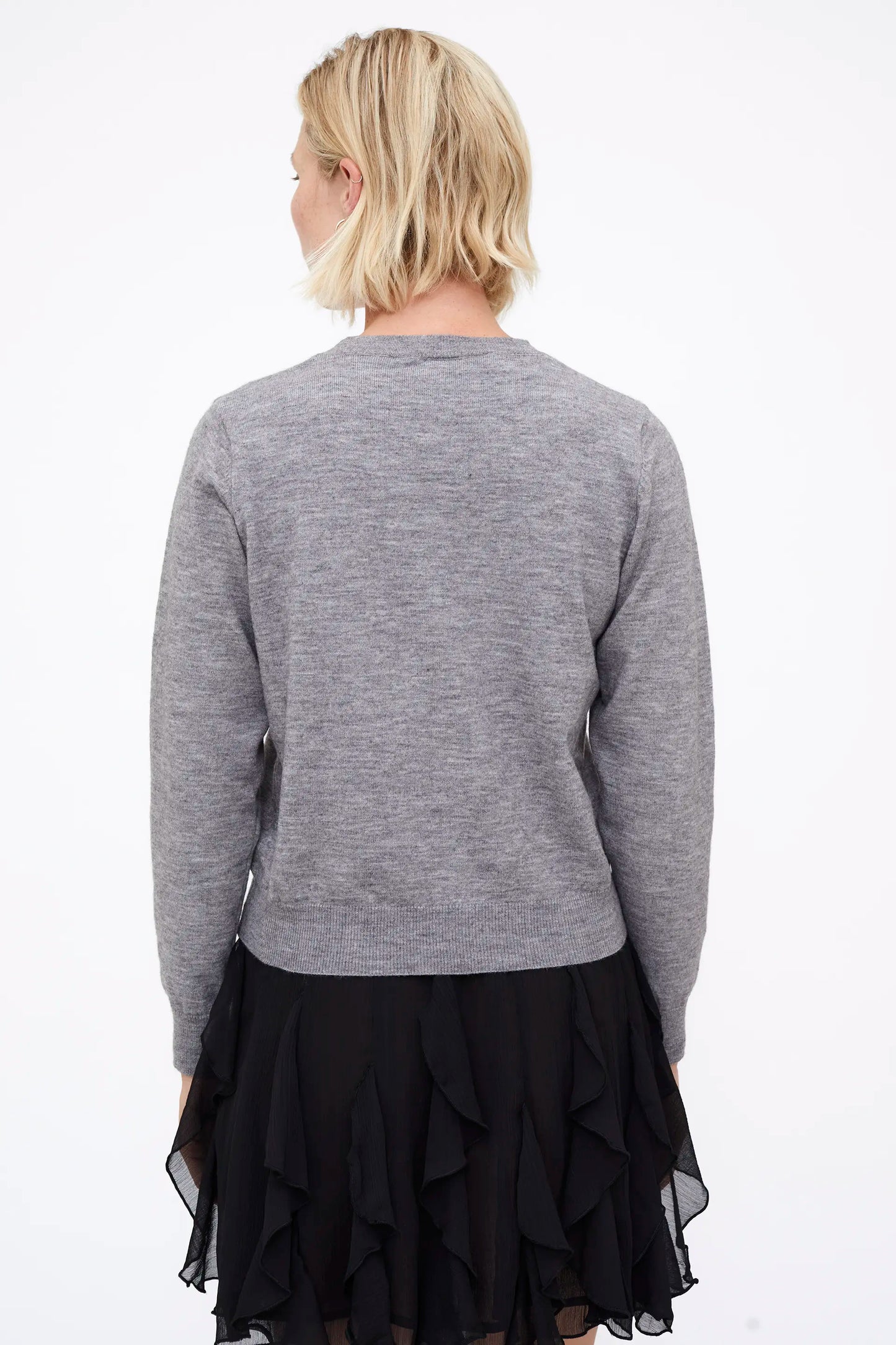 Jersey punto gris con aplique joya