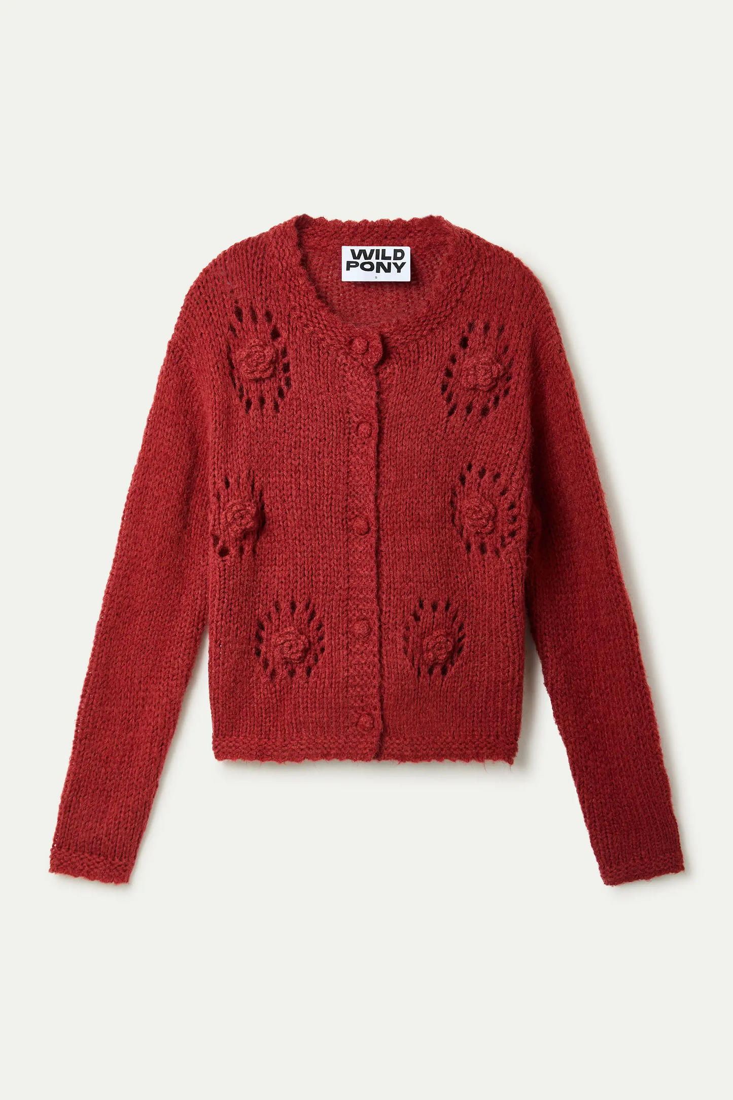 Cárdigan punto rojo con flores crochet