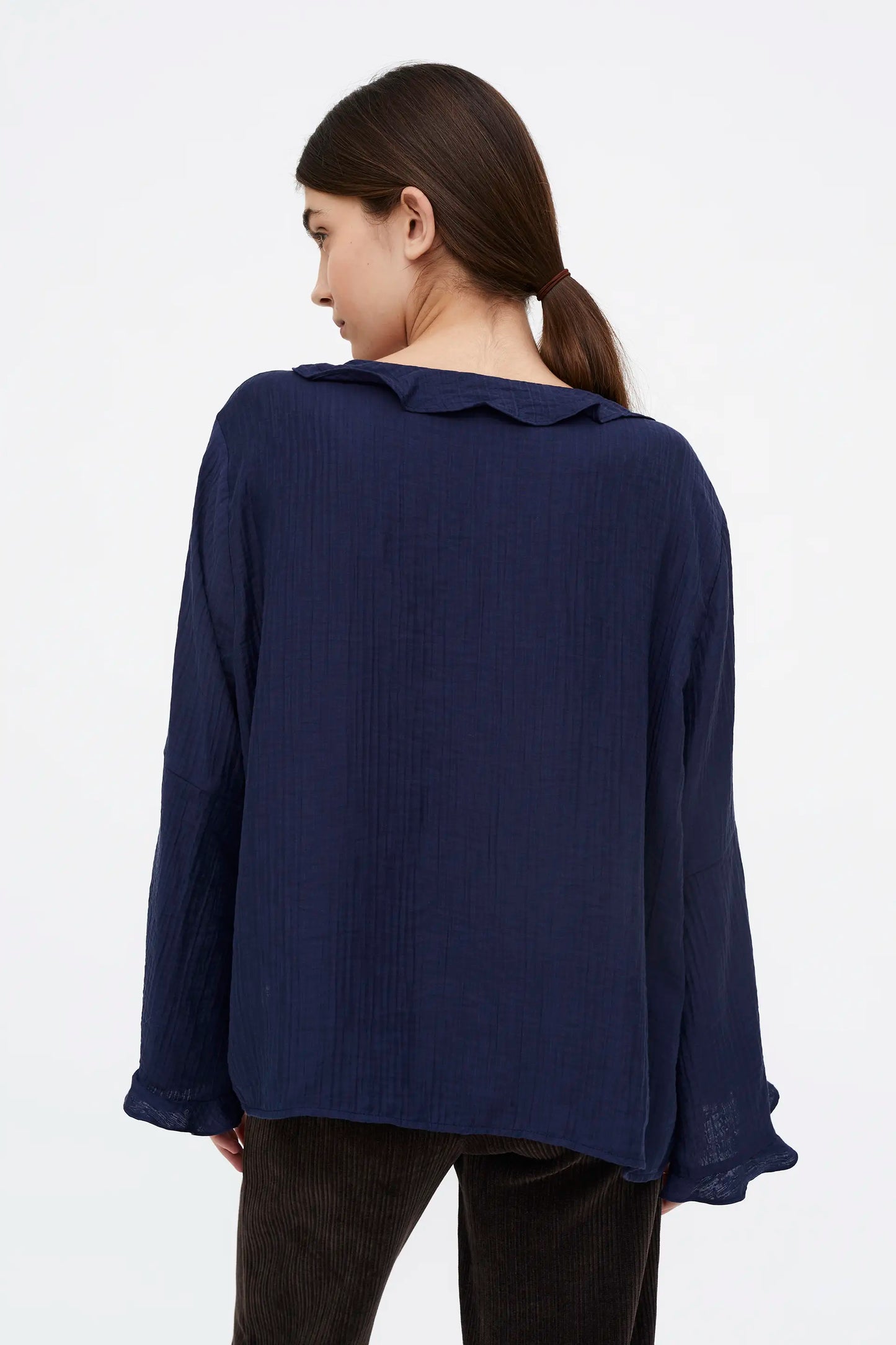 Top fluido con volantes azul