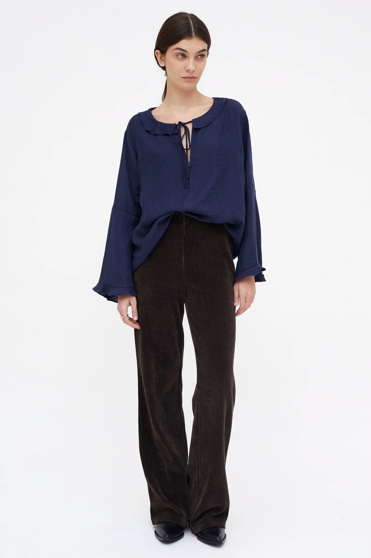 Top fluido con volantes azul