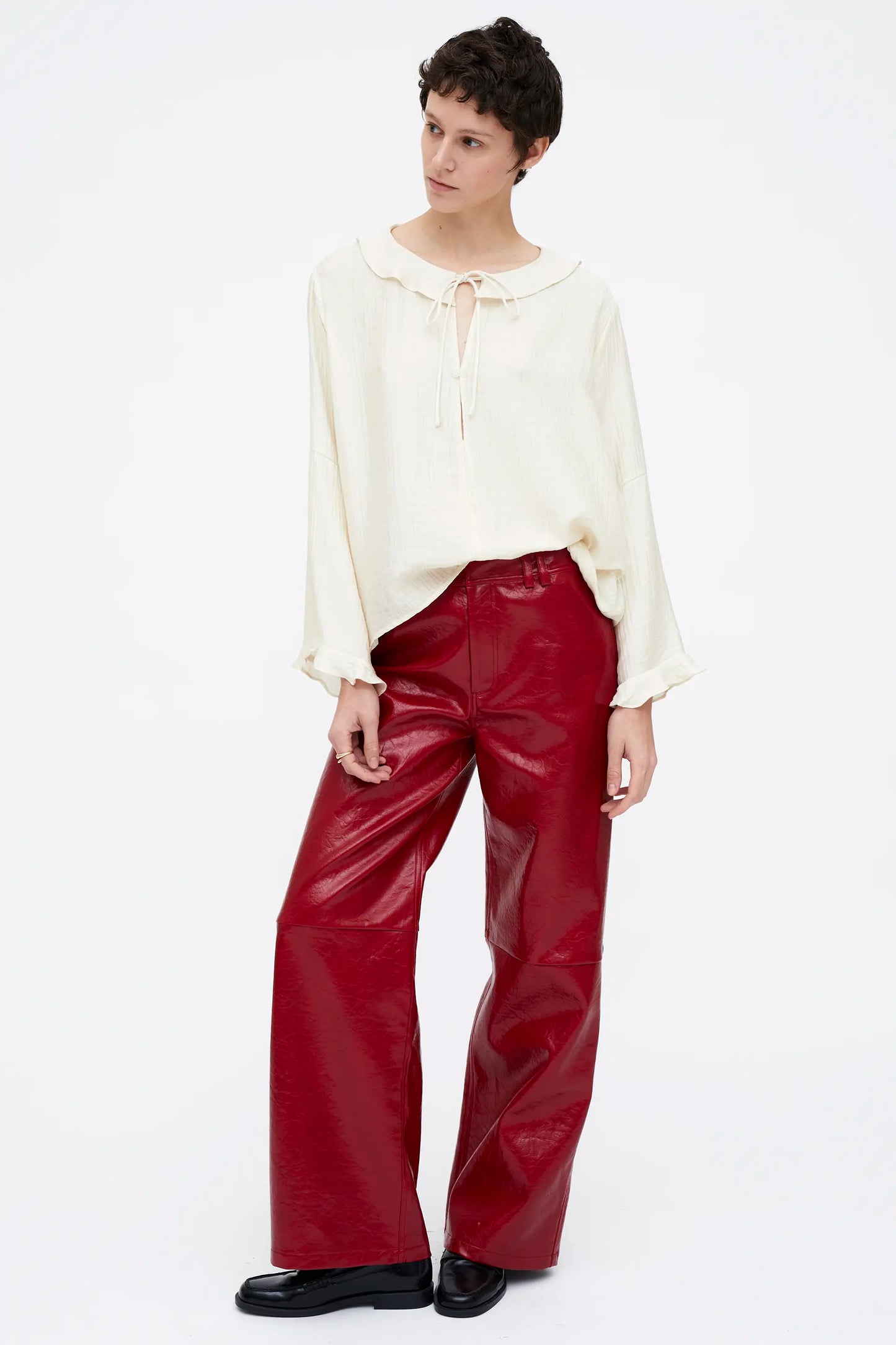 White flowing top with ruffles