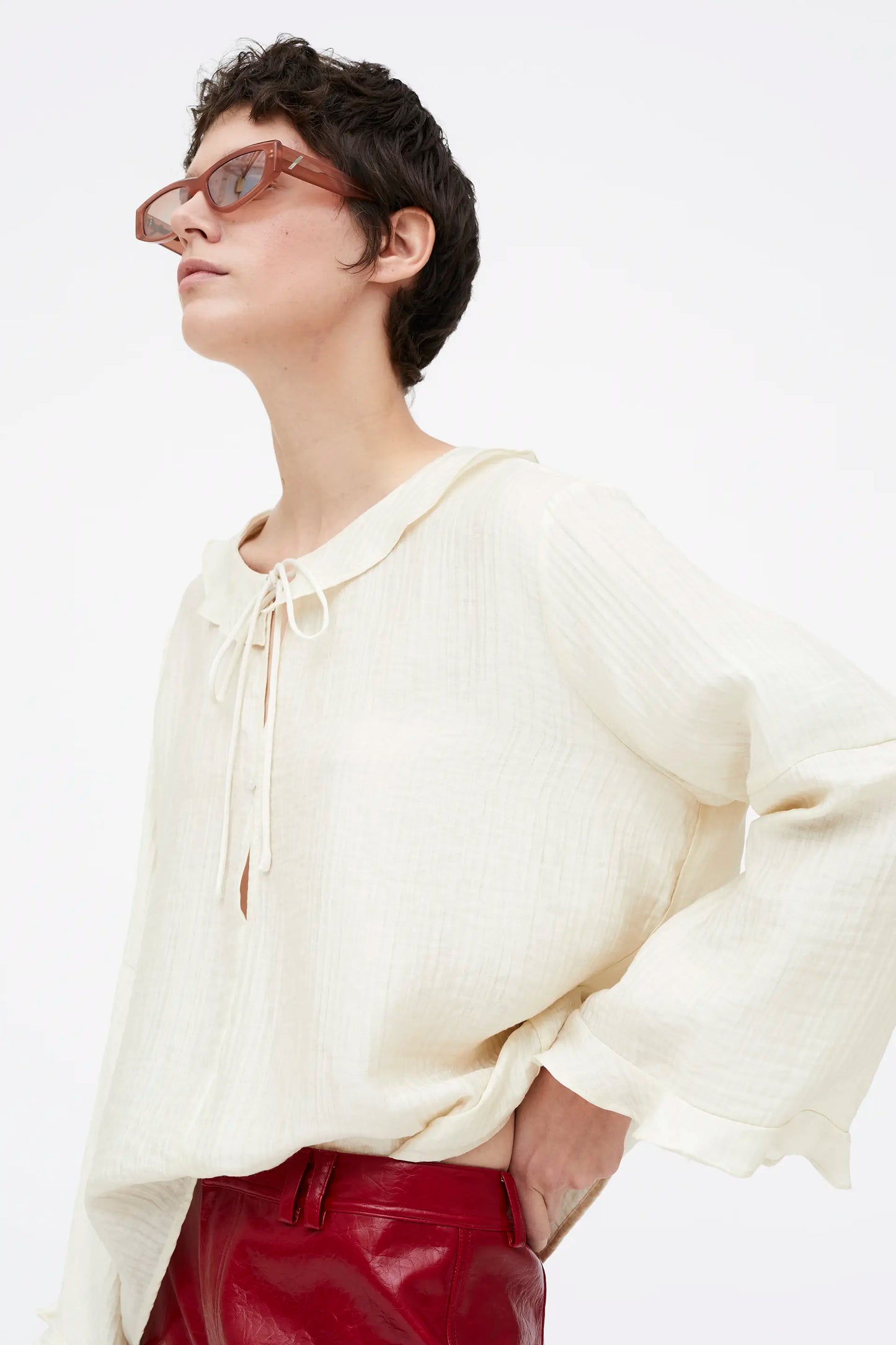 White flowing top with ruffles