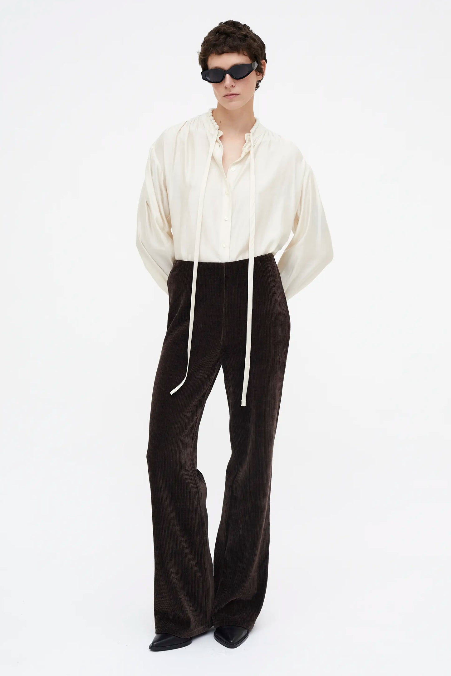 White flowing bow shirt