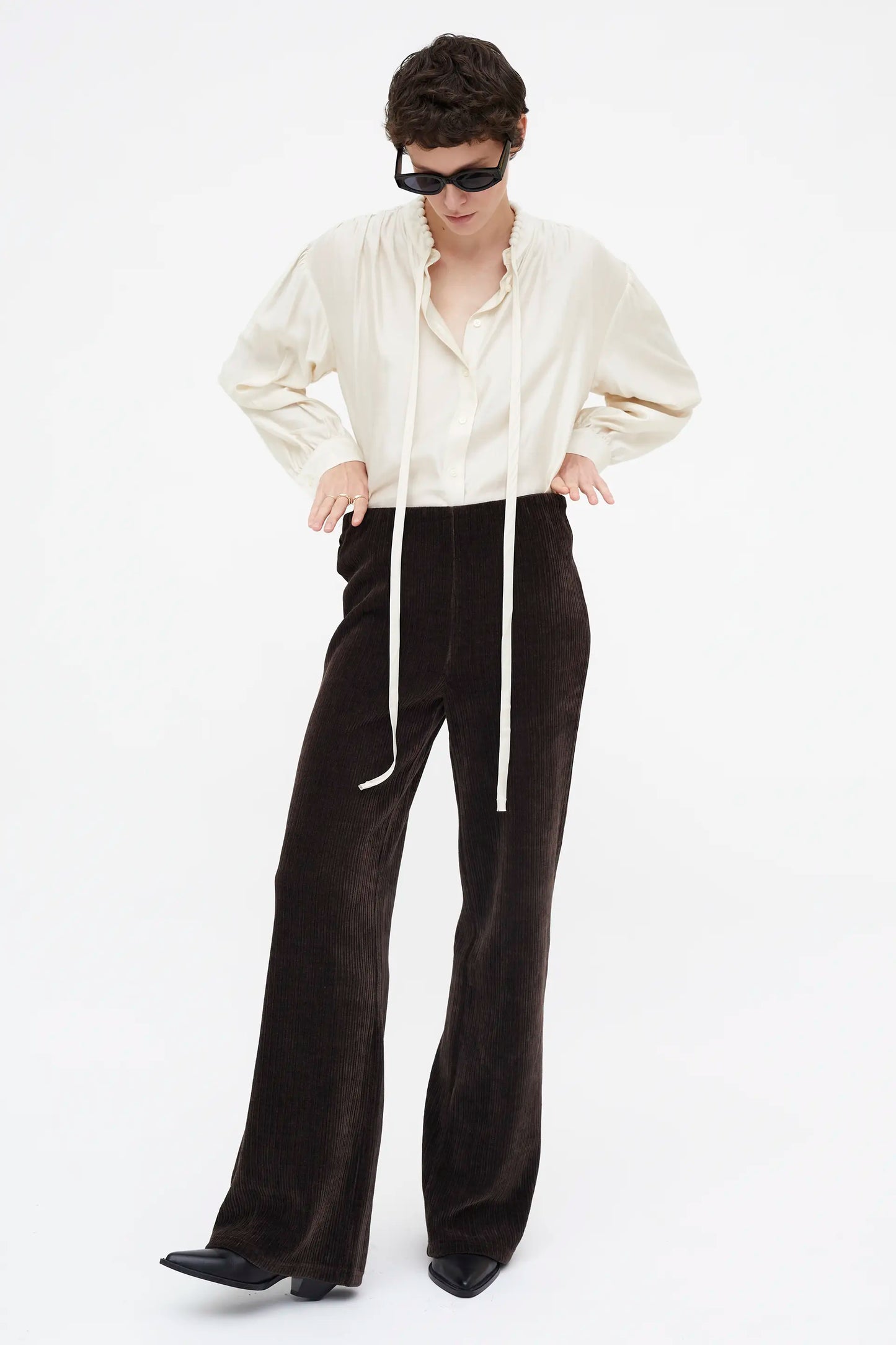 White flowing bow shirt