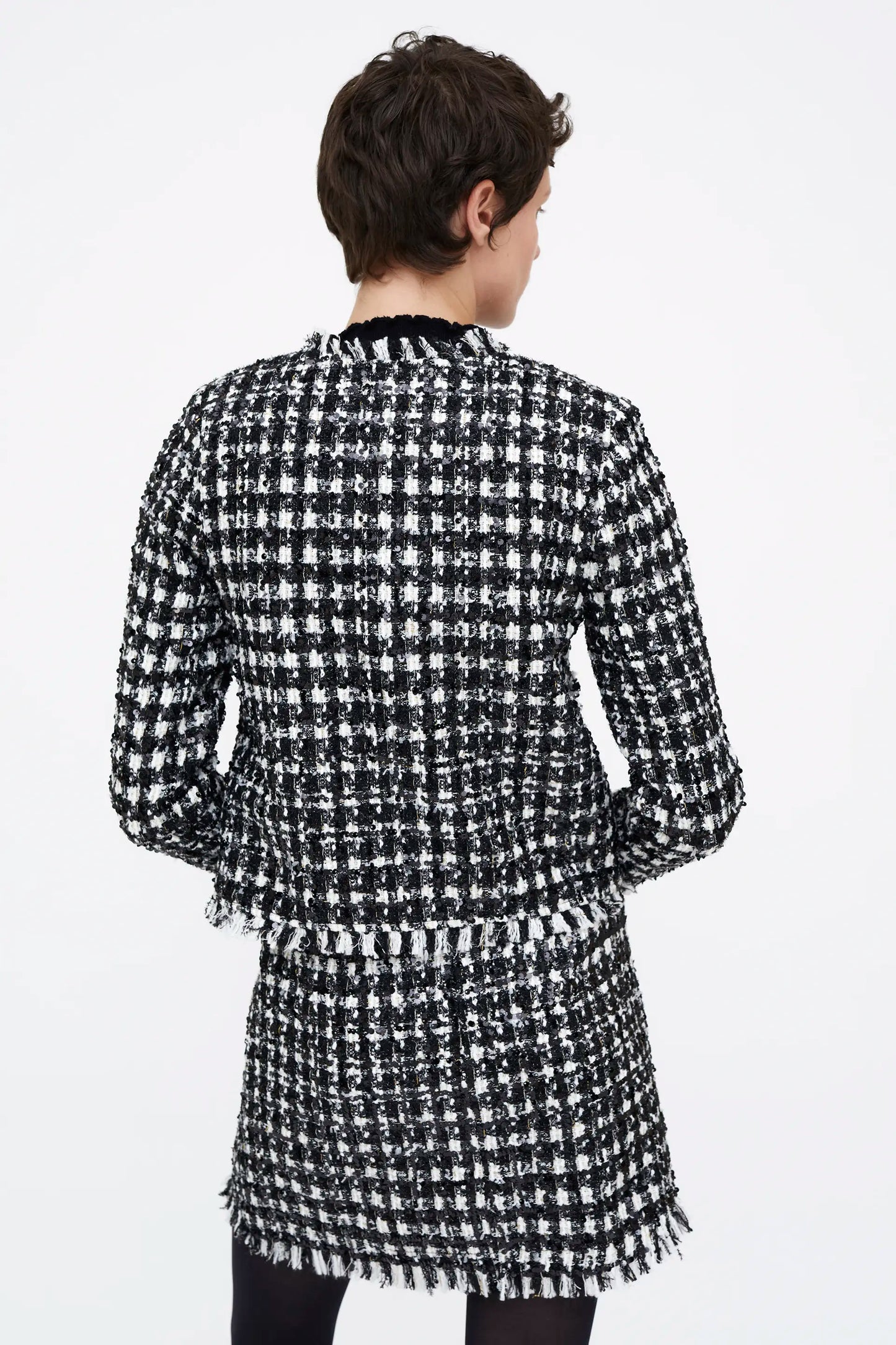 Chaqueta tweed blanco y negro