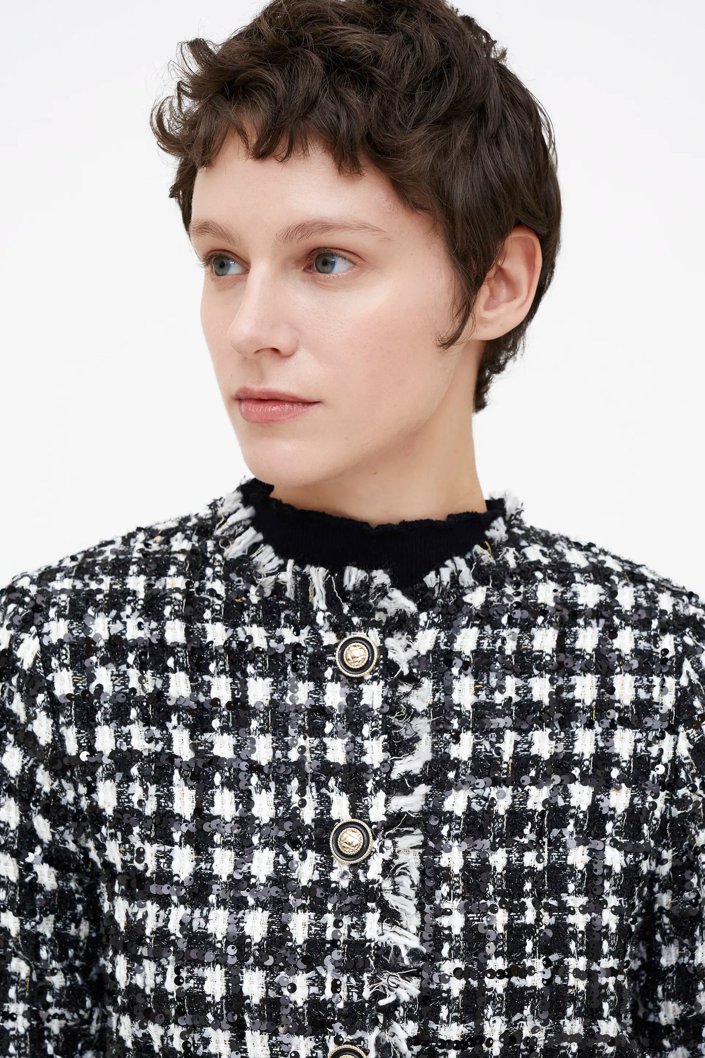 Chaqueta tweed blanco y negro