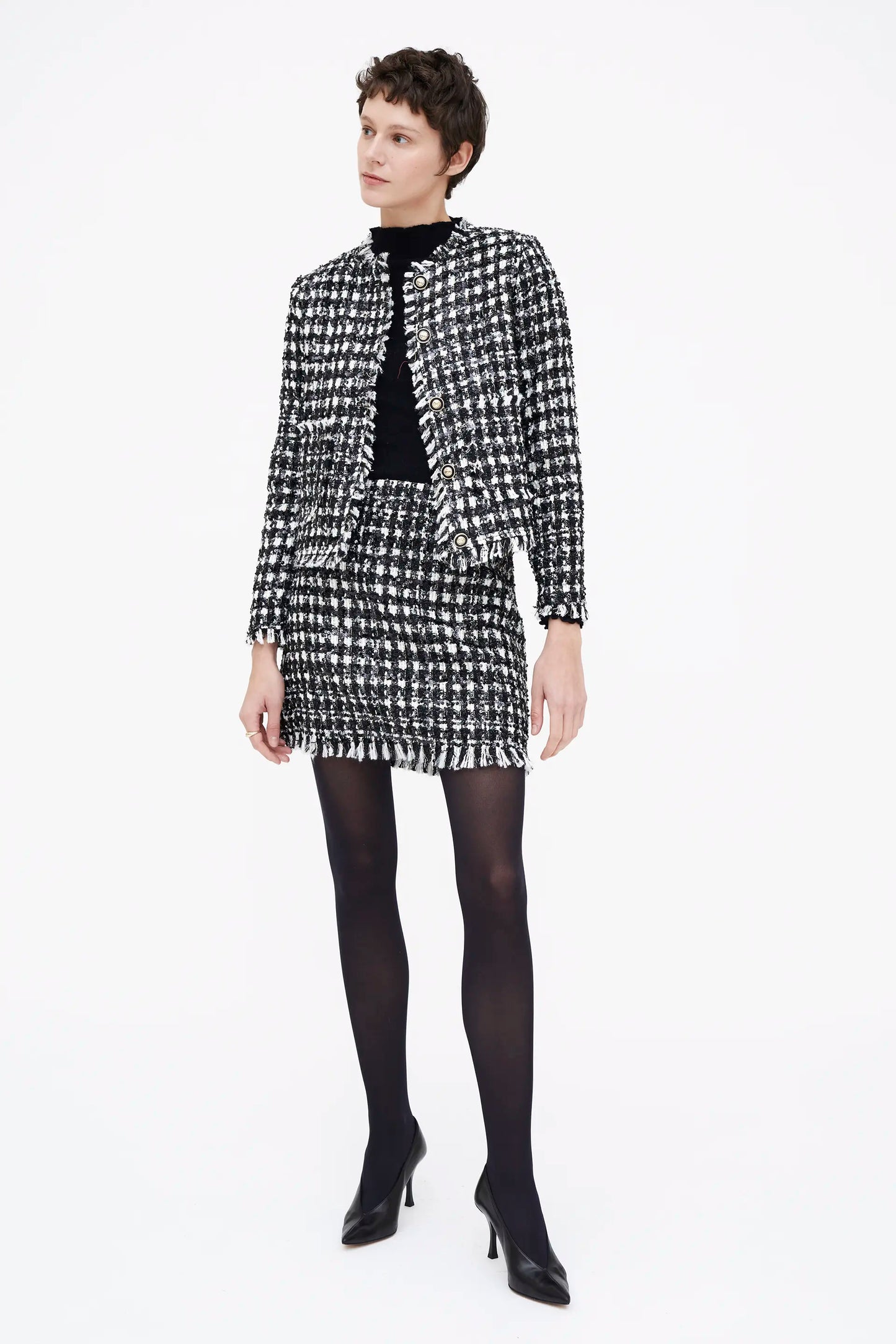 Chaqueta tweed blanco y negro