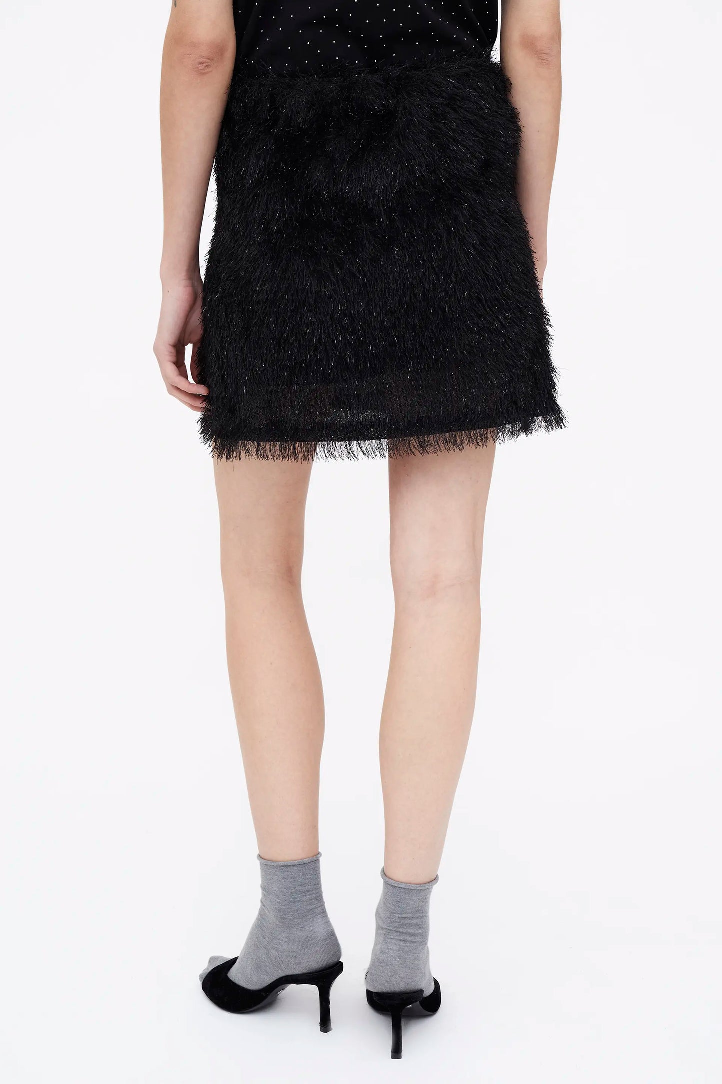 Falda corta negra con hilos Lurex