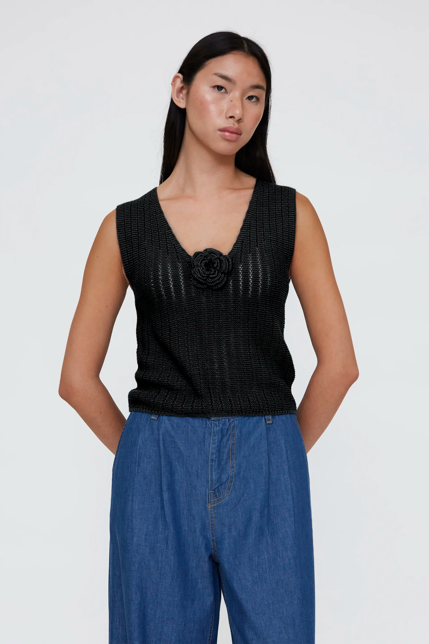 black openwork knit top