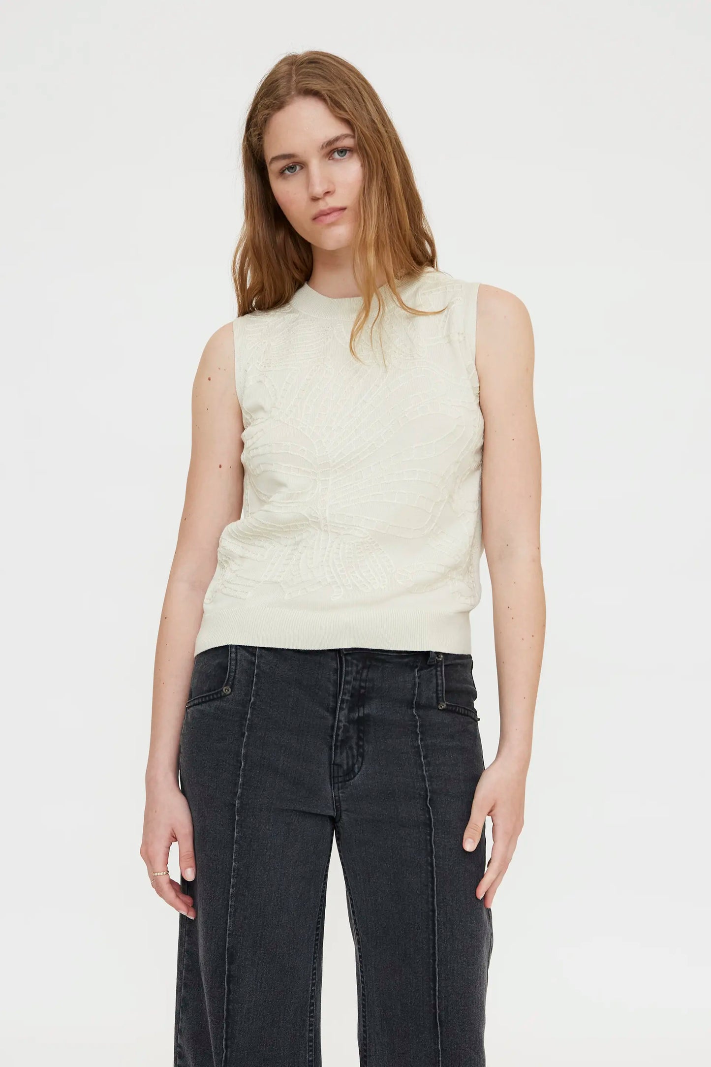 White embroidered knit top