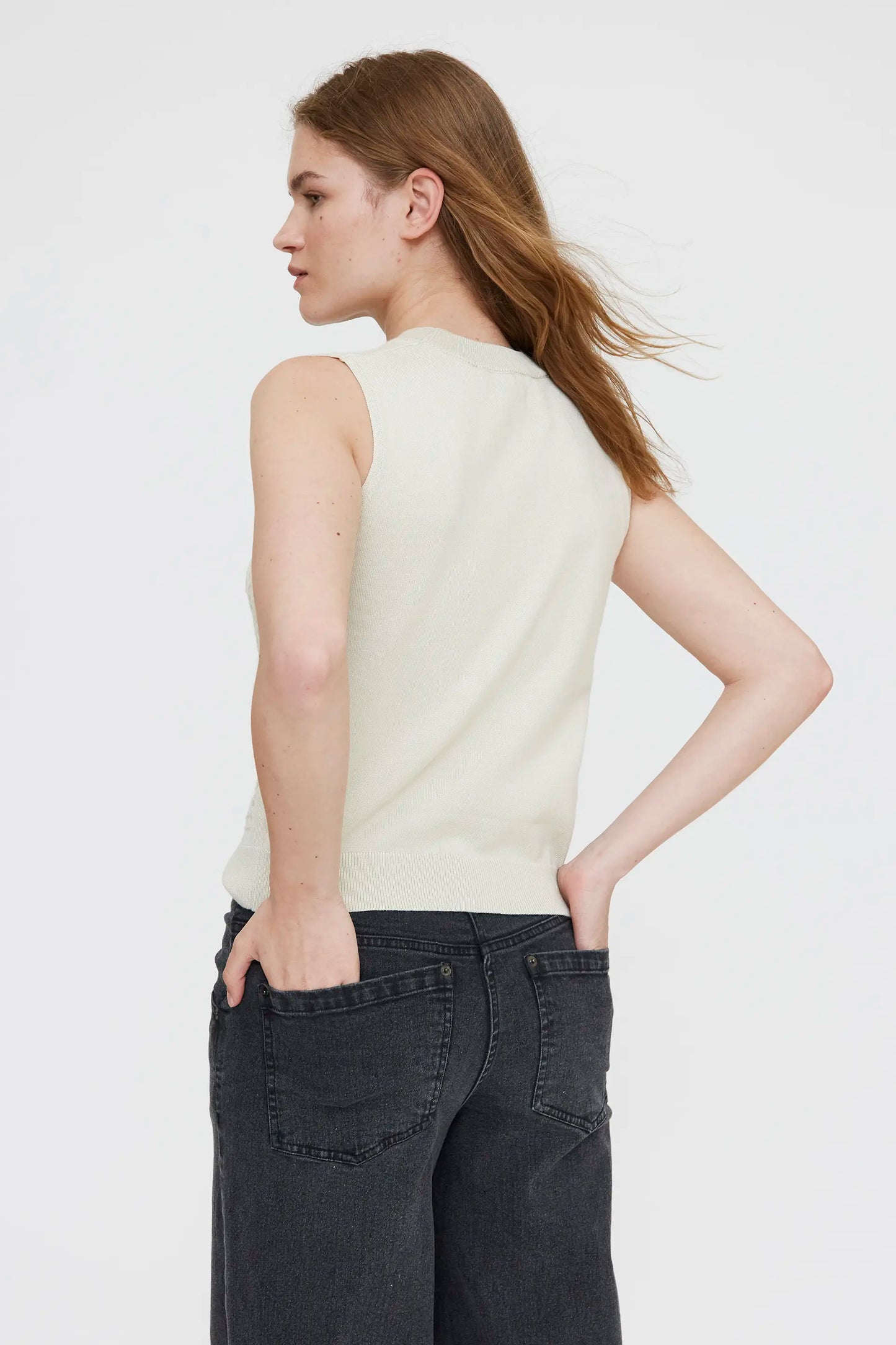 White embroidered knit top