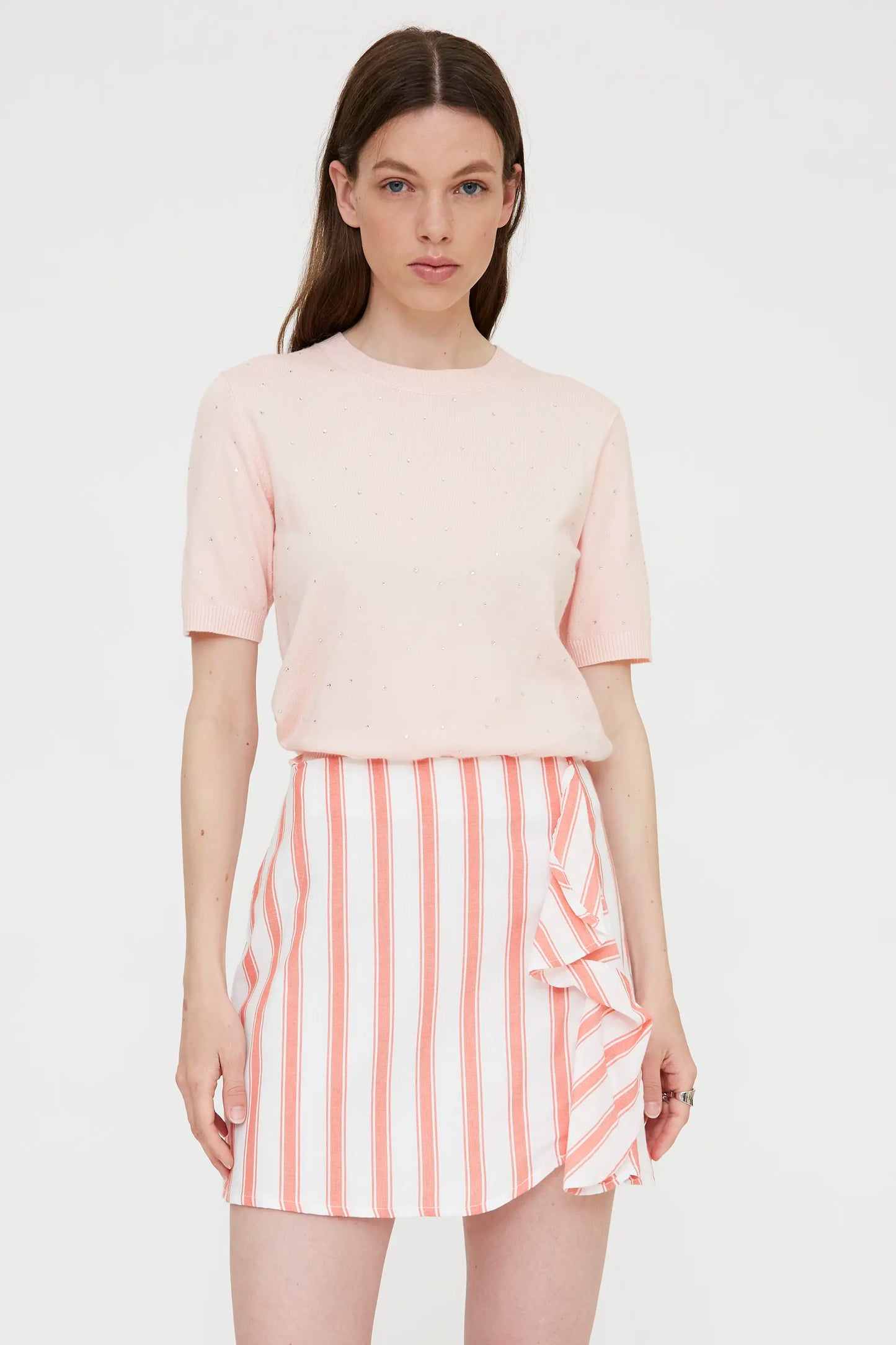 Pink knit top with rhinestone detail