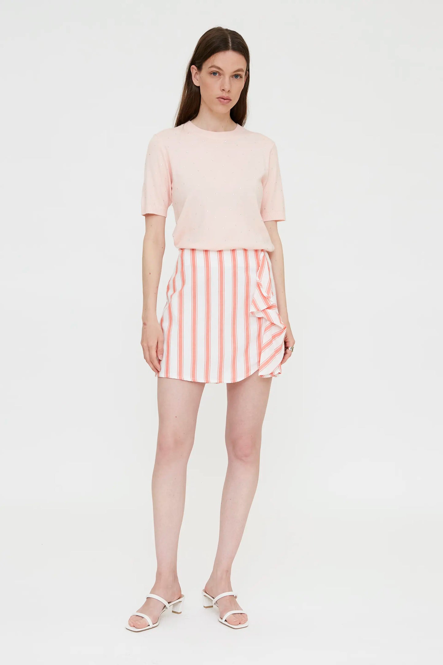 Pink knit top with rhinestone detail