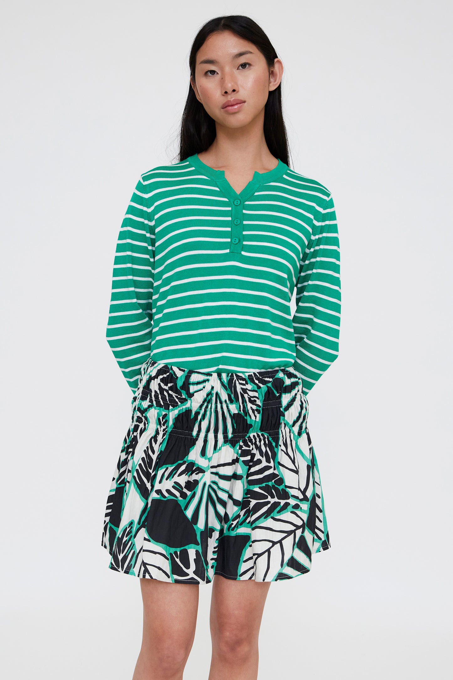 White and green striped knit sweater