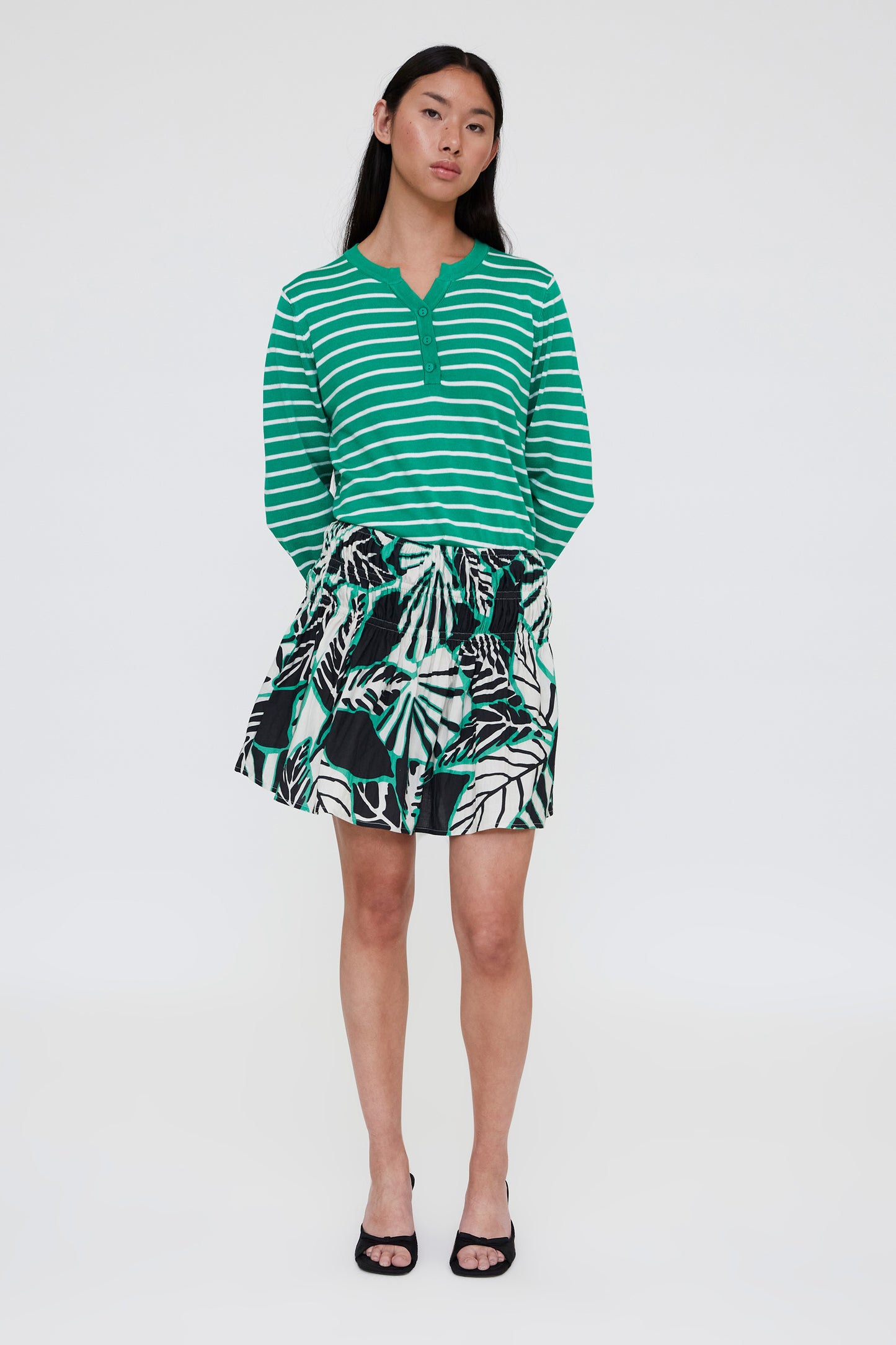 White and green striped knit sweater