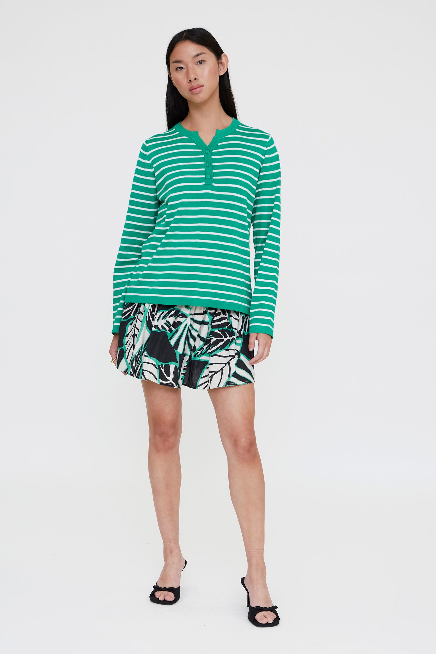 White and green striped knit sweater