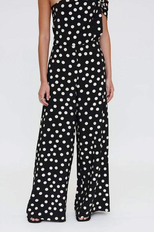 Pantalón con estampado de puntos negro y blanco