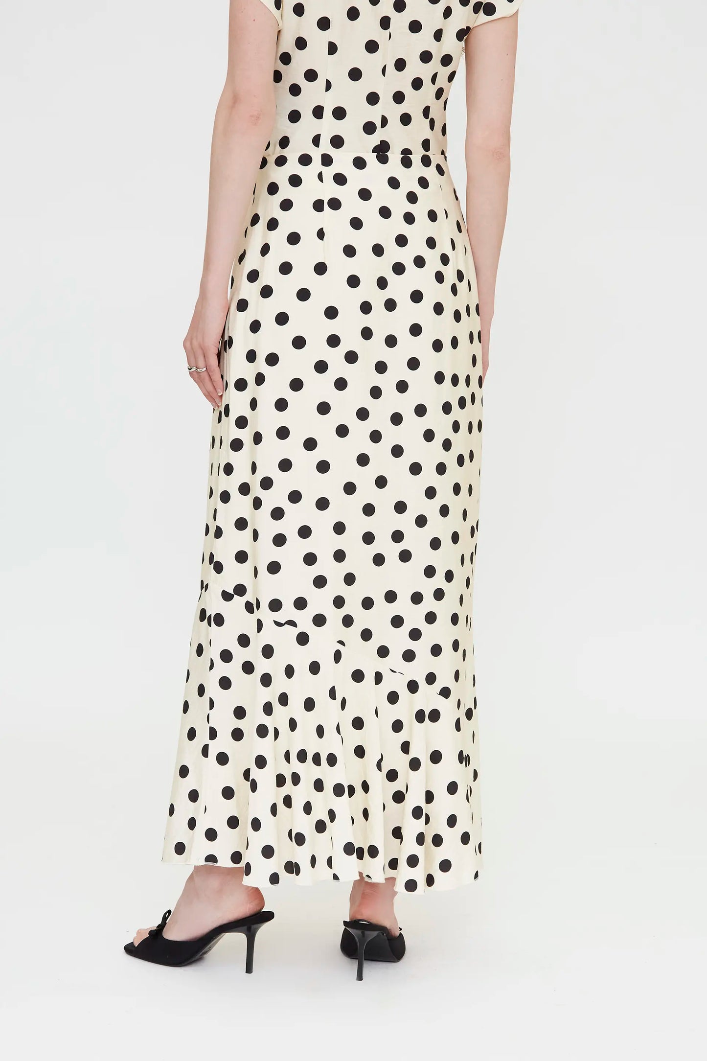 Long skirt with black and white polka dot print