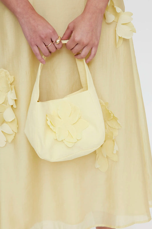 Bolso de mano amarillo claro