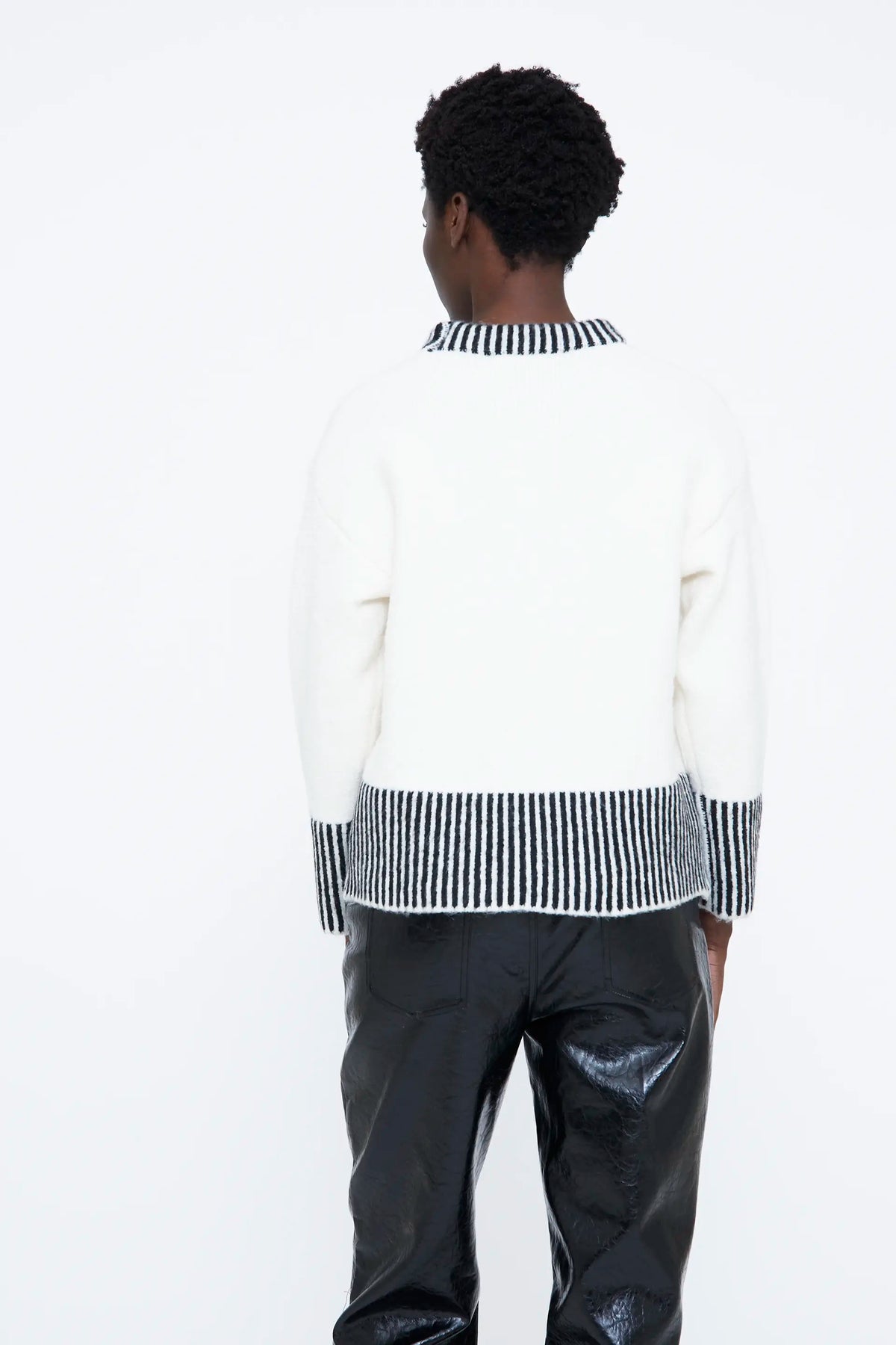 Black geometric print sweater