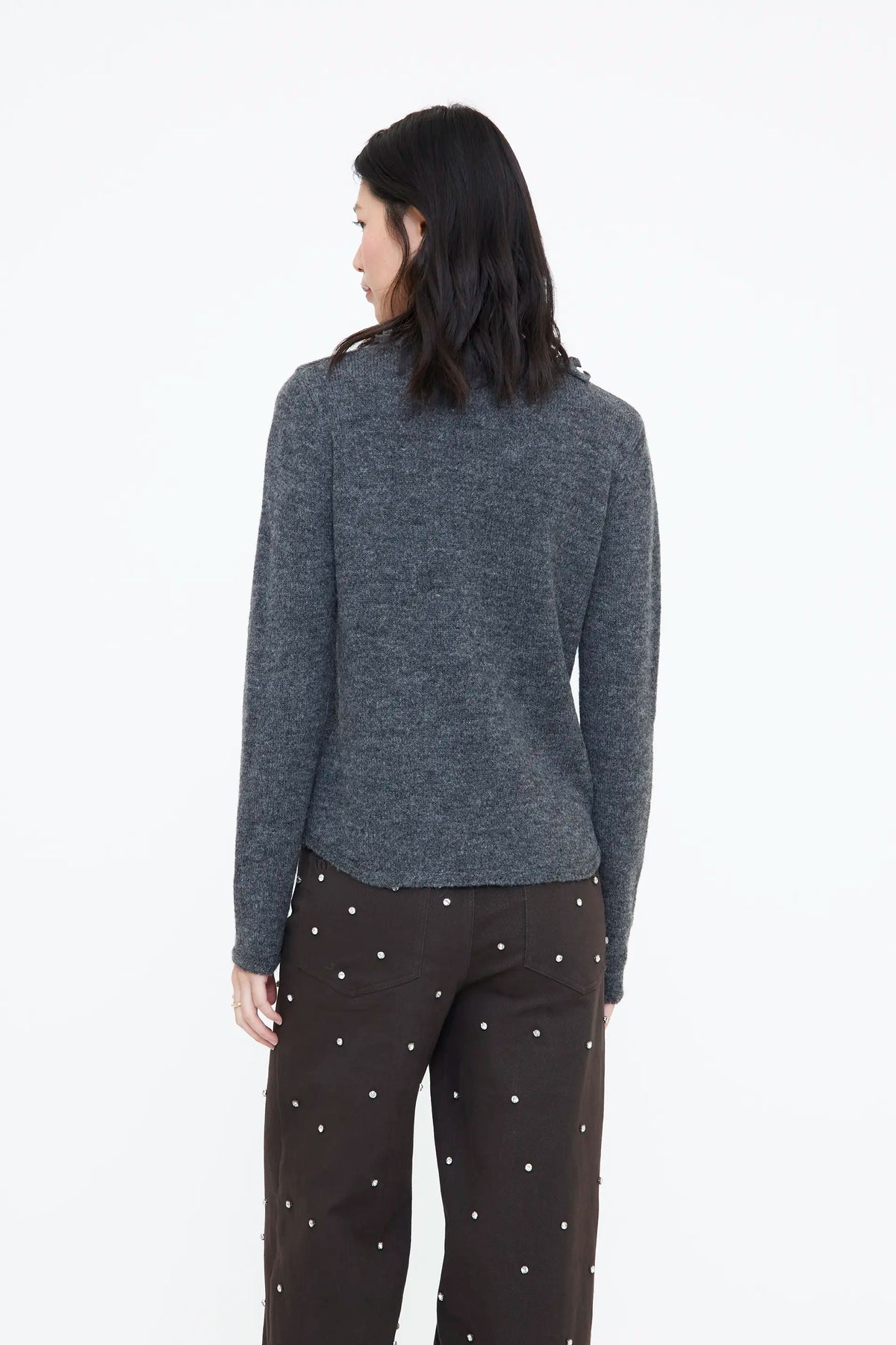 Grey knit sweater with mini ruffles