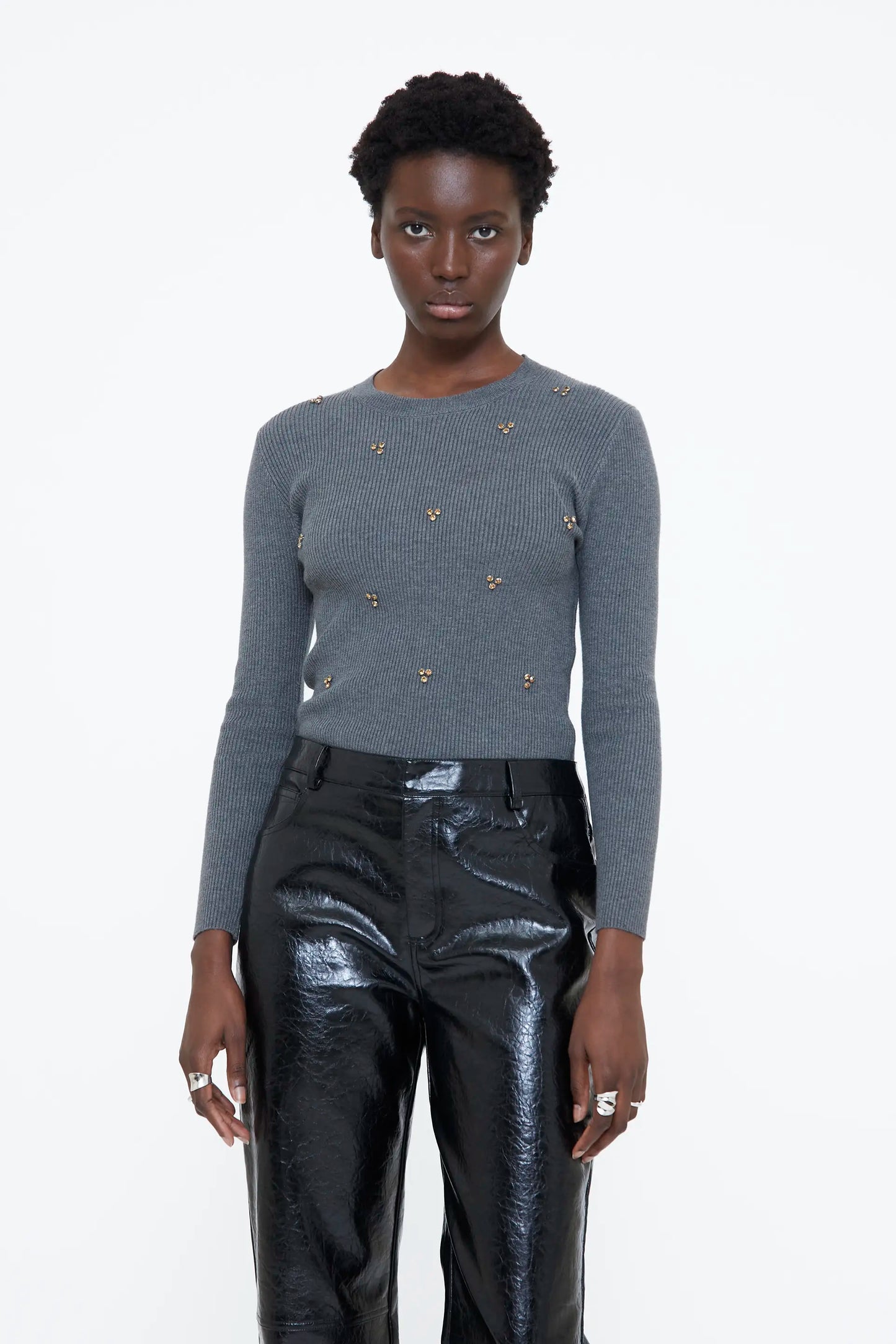 Gray sweater with multicolored appliques