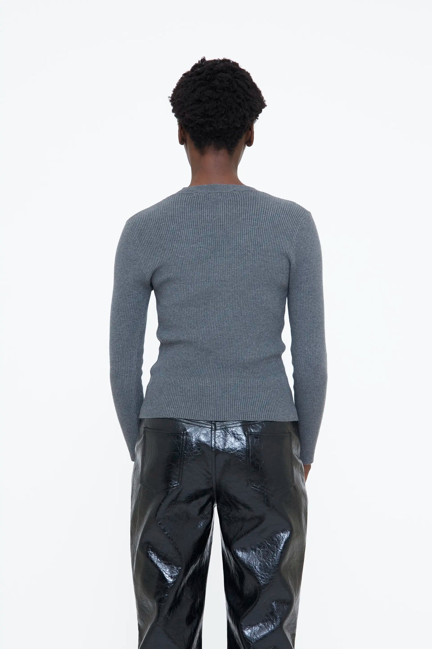 Gray sweater with multicolored appliques