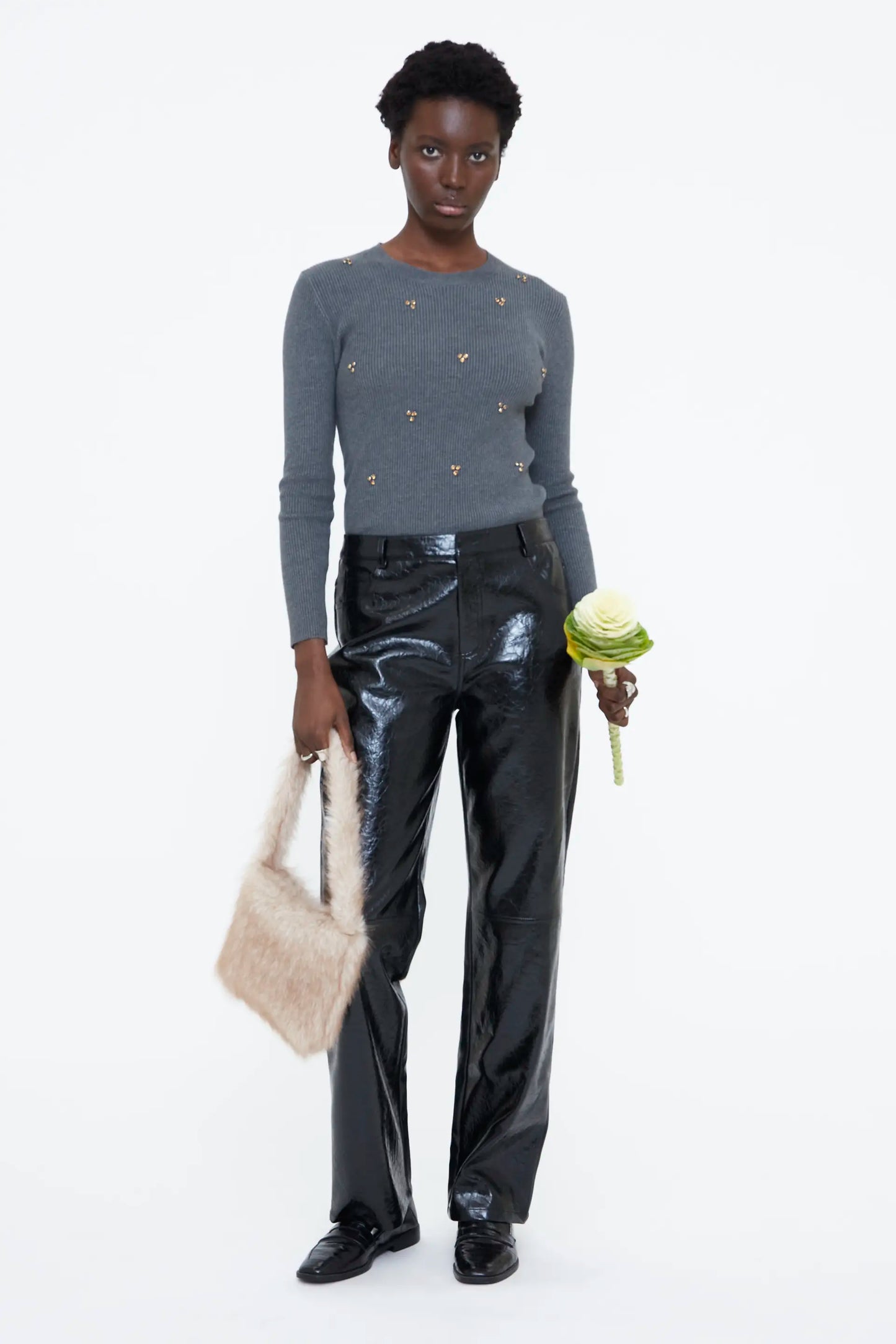 Gray sweater with multicolored appliques