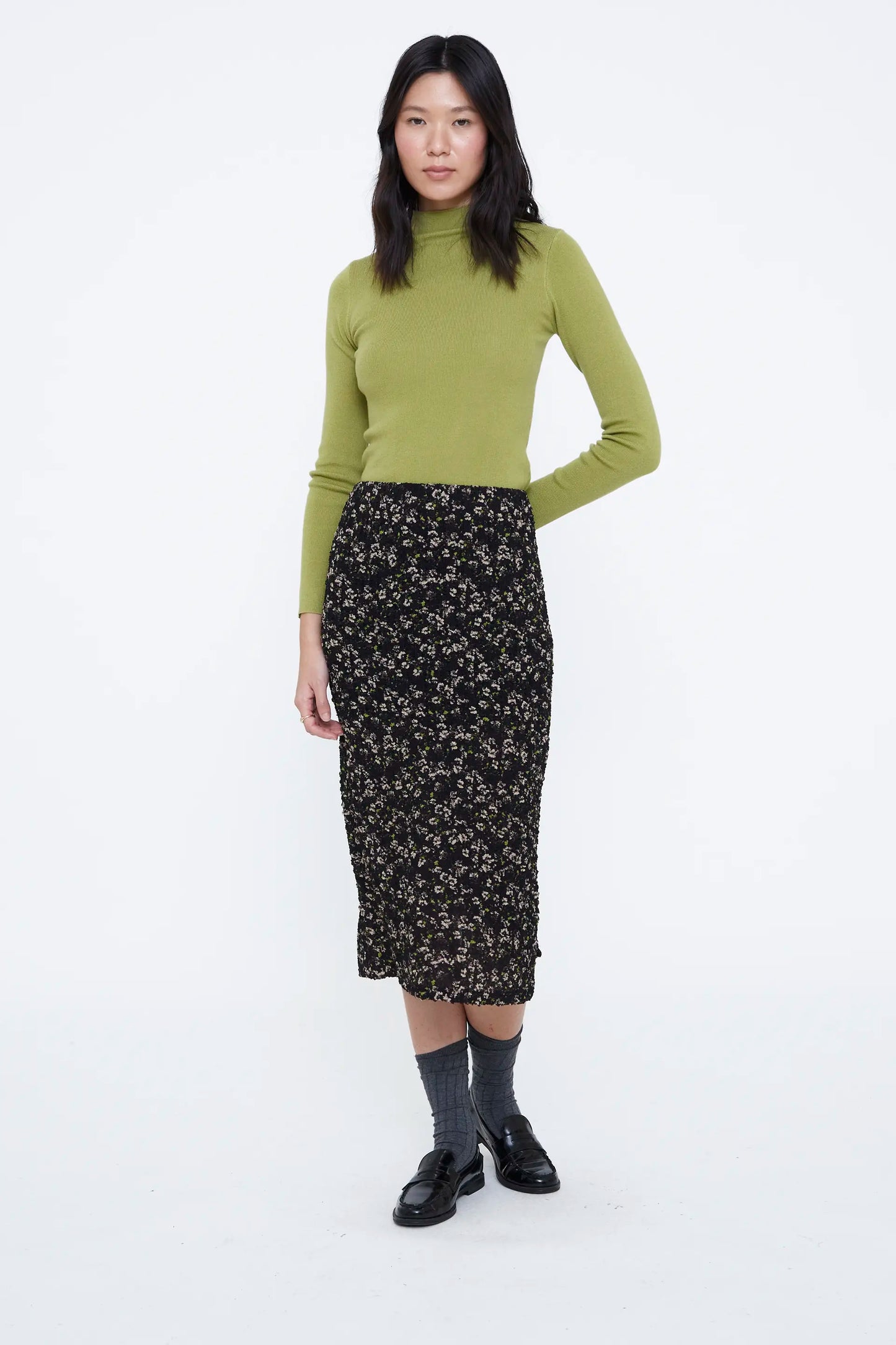 Top cuello alto verde