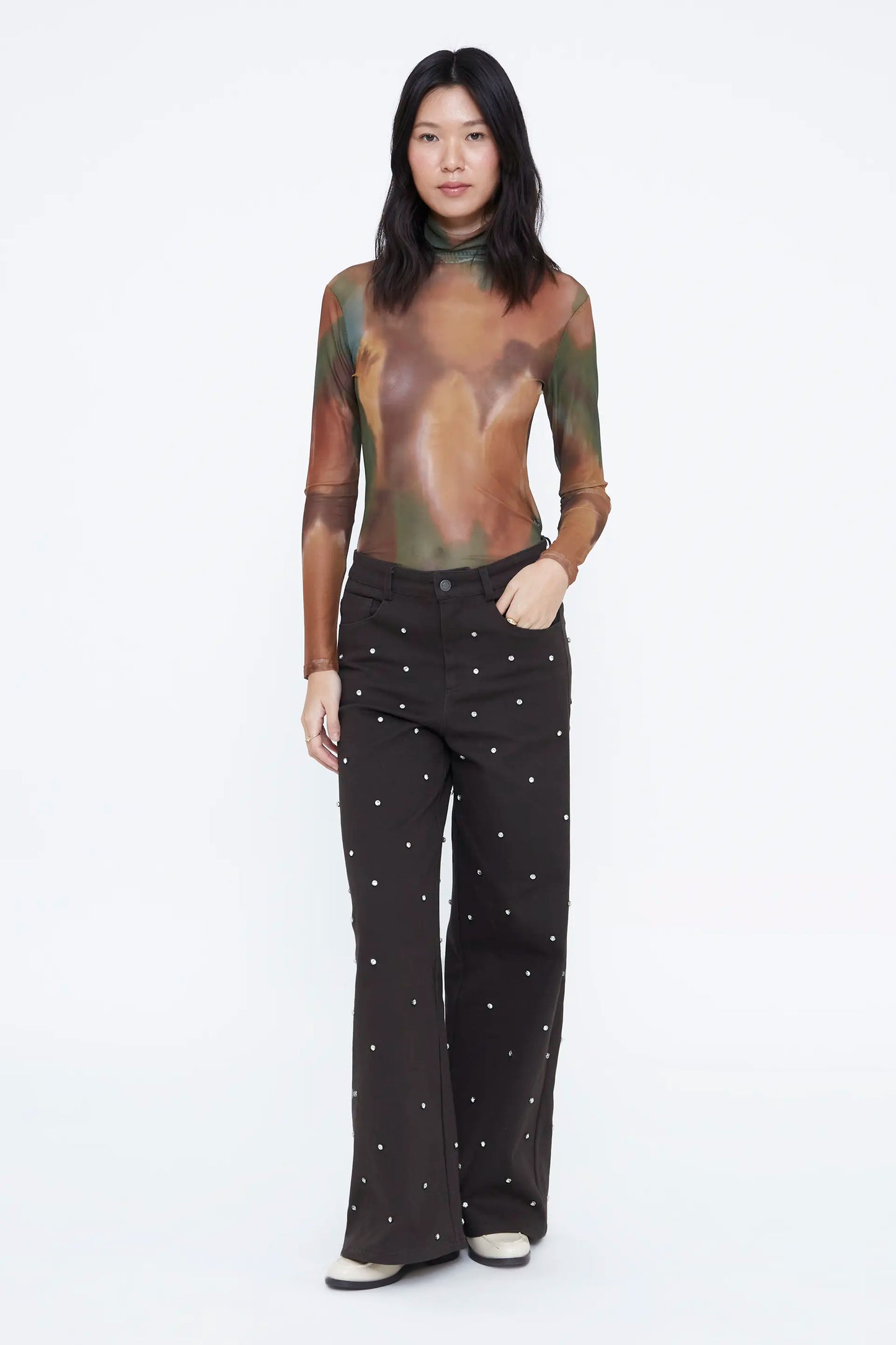 Pantalón vaquero verde oscura con apliques