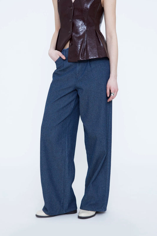 Navy blue denim jeans with frayed details