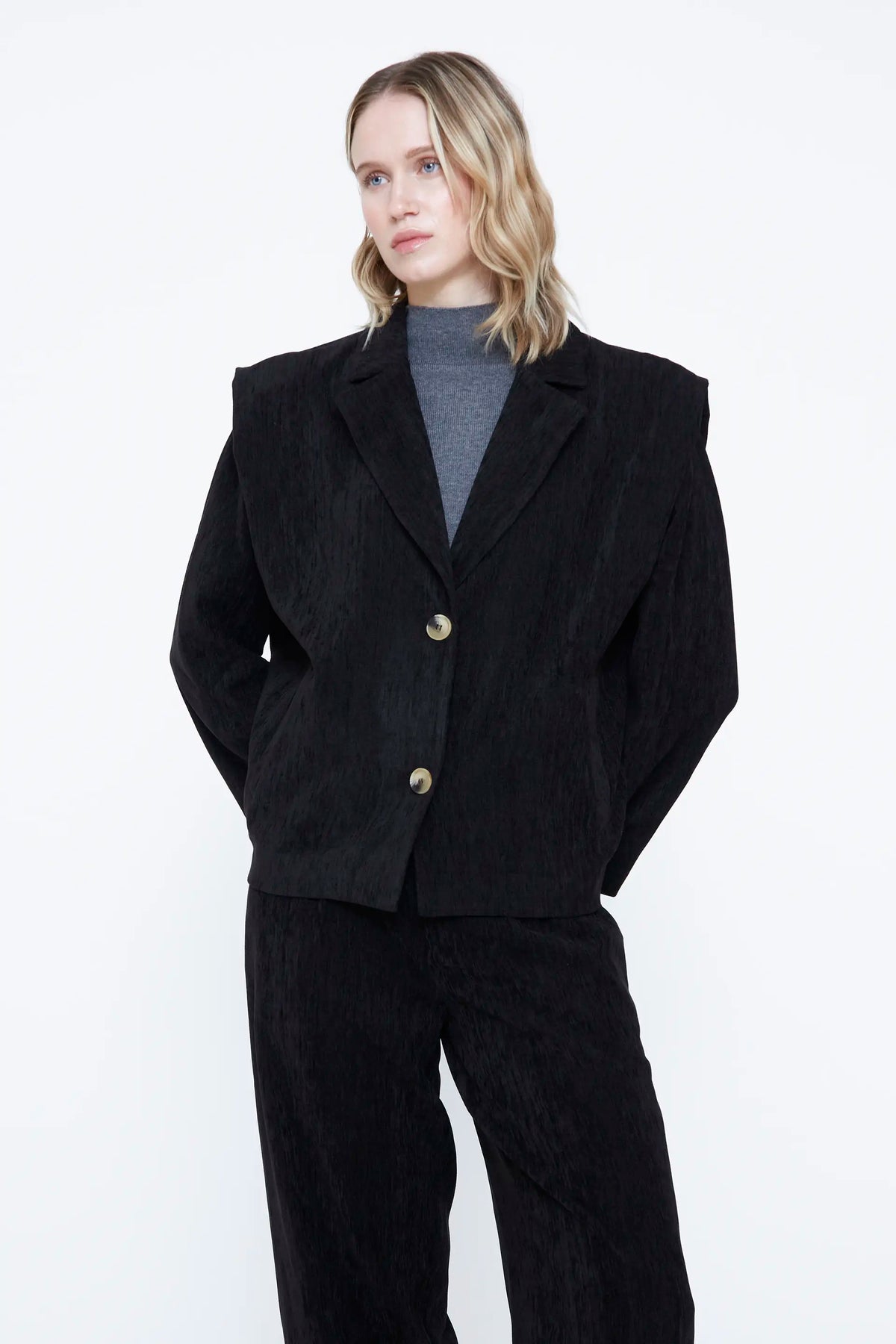 Black blazer with shoulder pads