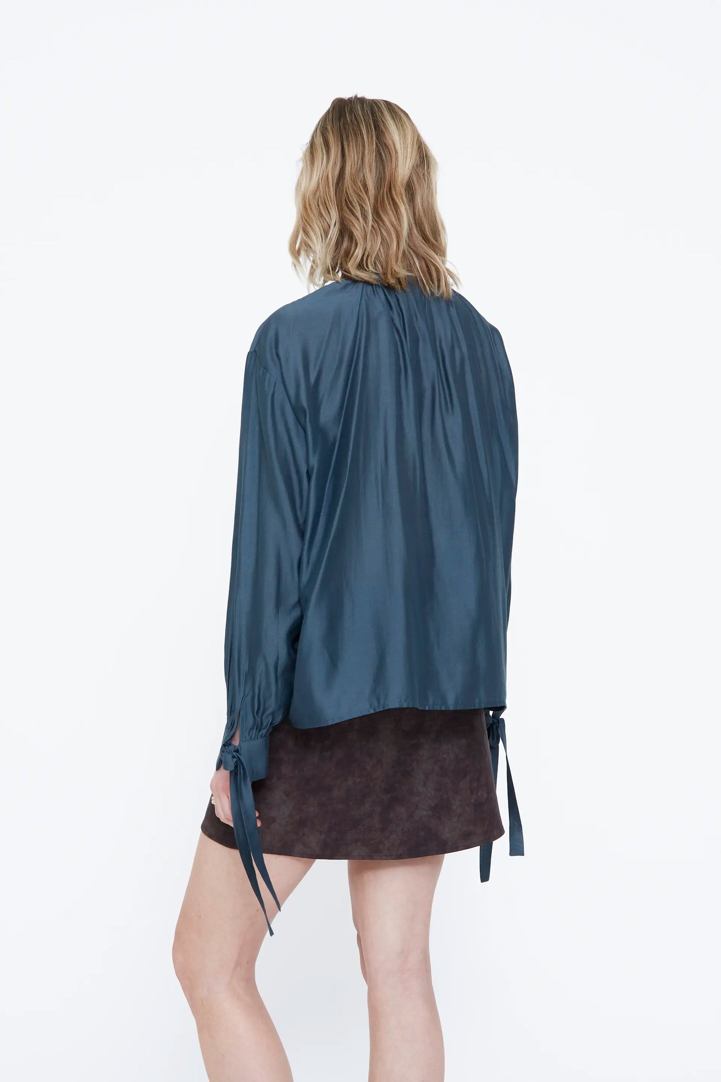Blue satin shirt with bow detail