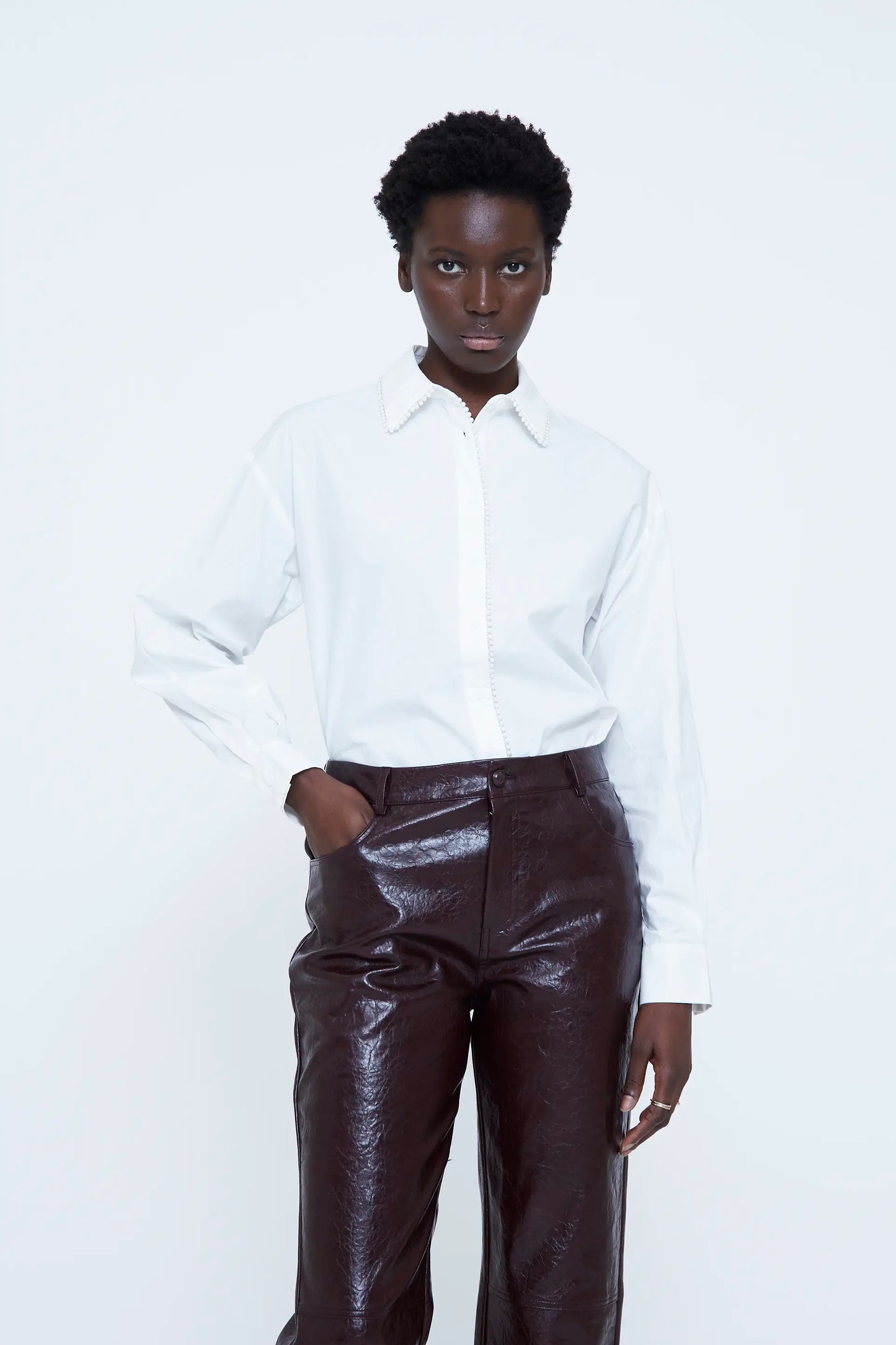 100% cotton white shirt with pearl detail